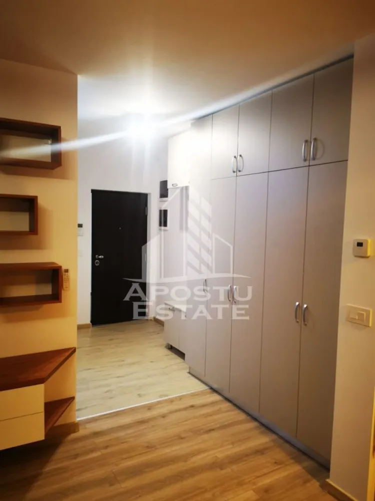 Apartament cu 2 camere , de inchiriat , Iris -Aradului , Timisoara - Agentia imobiliara APOSTU ESTATE va propune spre inchiriere un apartament cu 2 camere, spatios si luminos, situat in zona Aradului ,o zona linistita si bine pozitionata din Timisoara, potrivit pentru cupluri,familii, sau studenti care isi doresc o locuinta unde sa se simta confortabil si cu acces facil catre scoli, statii de autobuz, supermarketuri , magazine de zona, parcuri.

Suprafata utila: 52 mp
Compartimentare eficienta:
-Hol de acces generos
-Bucatarie complet mobilata si utilata, cu loc de luat masa
-Living luminos si spatios
-Dormitor mobilat si utilat
-Baie prevazuta cu cada
-Balcon deschis 

Confort si facilitati:
-Incalzirea apartamentului: centrala proprie cu încălzire in pardoseala 
-Apartamentul este complet mobilat si utilat de către proprietar 
-Loc de parcare subteran , daca se dorește fără loc de parcare prețul este de 450 e 

Localizare:
-Timis,Timisoara, zona Aradului – acces facil spre magazine, supermarketul Lidl, scoli, parcuri si mijloace de transport in comun.

Ideal pentru:
-Familii
-Cupluri
Pret chirie lunara: 500 euro 
Programeaza o vizionare pentru a-ti putea imagina viitorul aici!
ID intern: CP3129046