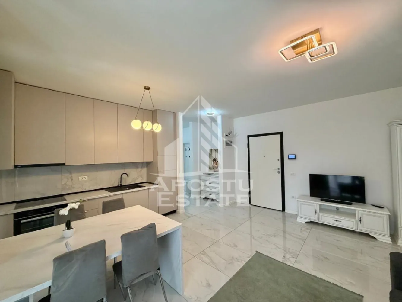 Apartament cu 2 camere de inchiriat, Future Residence, Giroc - Agentia imobiliara APOSTU ESTATE va propune spre inchiriere un apartament cu 2 camere spatios si luminos, situat in Giroc, Complexul Residential FUTURE RESIDENCE, potrivit pentru cupluri sau persoane singure care isi doresc o locuinta in care sa se simta confortabil
Suprafata utila: 52 mp

Compartimentare eficienta:
-Bucatarie deschisa complet mobilata si utilata, cu loc de luat masa
-Living luminos si spatios
-Dormitor complet mobilat si utilat
-Baie prevazuta cu cada si geam la baie pentru ventilatie naturala

Confort si facilitati:
-Loc de parcare subteran inclus in pret
-Acces la piscina complexului
-Masina de spalat rufe
-Aer conditionat
- Balcon
-Incalzirea apartamentului: centrala proprie (incalzire prin pardoseala)

Localizare:
-Timis, Giroc- Future Residence, in spatele supermarketului Lidl, proximitatea StayFit Gym, Penny, Mega Image
Ideal pentru:
-Persoane singure
-Cupluri

Disponibilitate: imediata
Pret chirie lunara: 500 EURO
Programeaza o vizionare pentru a-ti putea imagina viitorul aici!
ID intern: CP3130064