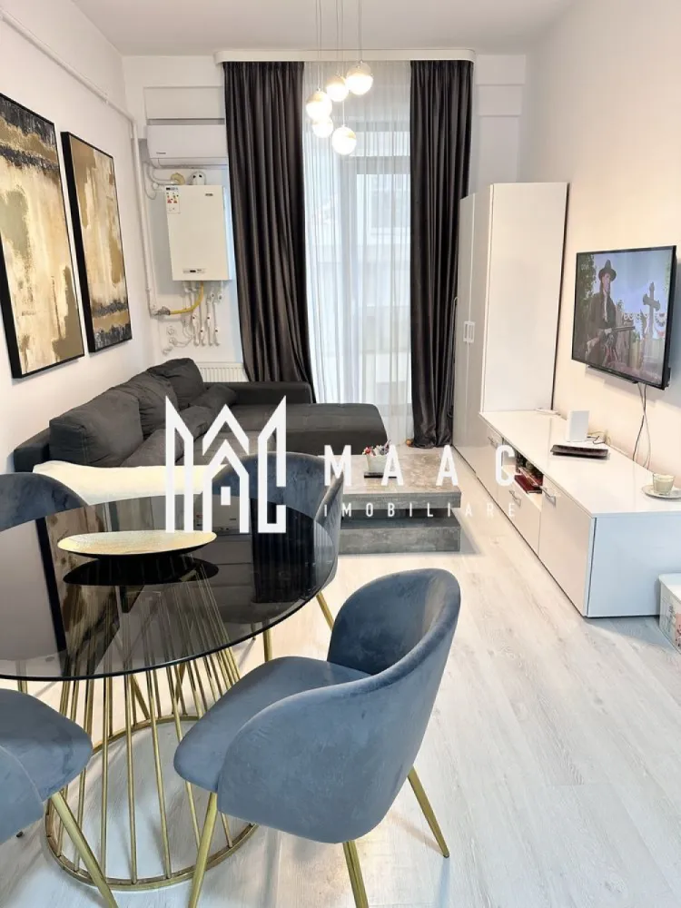 Apartament 2 camere| Finisat modern | Doamna Stanca - Maac Imobiliare propune spre vânzare un apartament cu 2 camere, situat în ansamblul Azur Residence, Doamna Stanca – o zonă în continuă dezvoltare, ideală atât pentru locuit, cât și pentru investiție.

Situata la parter înalt, intr-un imobil finalizat in 2019, locuinta are o bucatarie open-space cu livingul, un dormitor, baie cu dus.

Complet mobilat, modern, cu finisaje de calitate și un design interior ce aduce o nota de confort si echilibru.
In pret este cuprins si un loc de parcare spațios – 30 mp, prins in CF.

Pentru mai multe detalii va rugam specificati telefonic ID: CP2744994