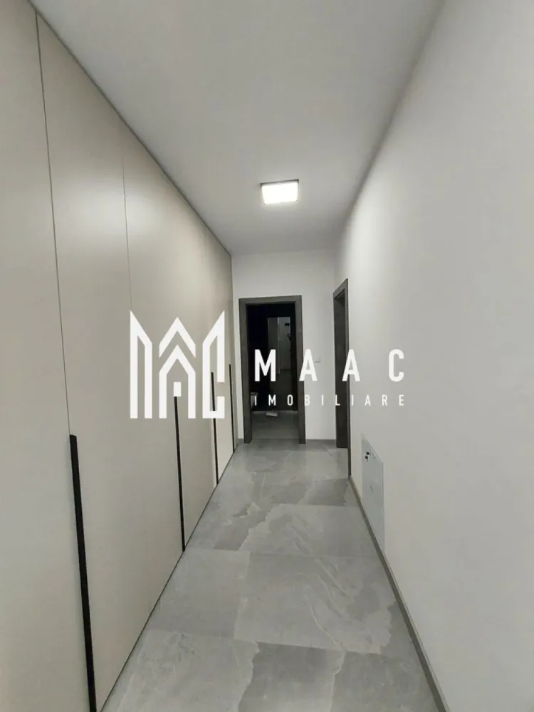 Apartament 2 camere decomandat | Șelimbăr | 66 mp, grădină, parcare - Apartament cu 2 camere decomandat, situat în Șelimbăr, cu 66 mp utili, balcon și grădină de 30 mp, disponibil la prima închiriere. Locuința este finisată modern, complet mobilată și utilată, potrivită pentru mutare imediată.

Detalii proprietate:
• Suprafață utilă: 66 mp
• Suprafață construită: 74,4 mp
• Compartimentare: living, dormitor, bucătărie, baie, hol, balcon
• Etaj 1 din 2
• Apartament decomandat, confort 1
• Finisaje moderne, construcție finalizată
• Se predă complet mobilat și utilat
• Dotări: mașină de spălat rufe și mașină de spălat vase
• Balcon și grădină de aproximativ 30 mp
• Loc de parcare inclus
• 1 baie, 1 bucătărie

Proprietatea este amplasată pe Strada Pictor Nicolae Brana, în Șelimbăr, și oferă un spațiu bine organizat pentru locuire confortabilă. Prima închiriere și disponibilitatea imediată o recomandă pentru cei care caută un apartament pregătit pentru mutare.

Cod anunț CP3131923. Contactați-ne pentru detalii suplimentare și pentru programarea unei vizionări.

Conținut optimizat cu AI, aprobat de agent uman.