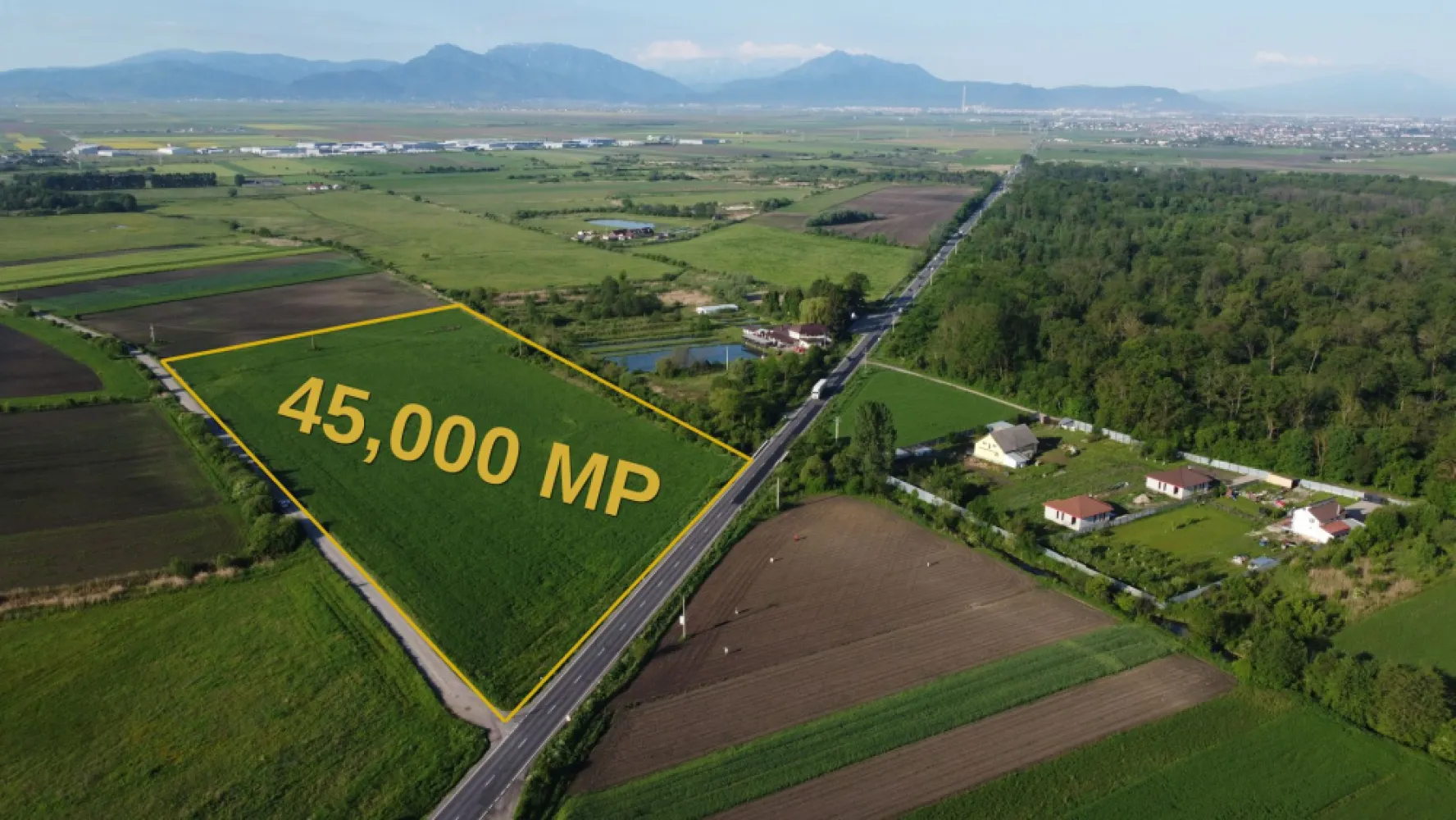 Industrial Land for Sale ROMANIA - BRASOV | 45,000 sqm - 45,000 sqm PUZ Approved Industrial Land near Brașov, Romania
Exceptional investment opportunity in one of Brașov's most promising industrial and logistics corridors.

Located in Prejmer – Lunca Câlnicului, this 45,000 sqm intravilan land parcel benefits from direct access to DN11 and excellent connectivity to Brașov, regional transport routes, and Brașov-Ghimbav International Airport.
Key Property Highlights
Land Area: 45,000 sqm
Intravilan Land
PUZ Approved
Designated for Logistics, Warehousing, Offices & Light Industrial Development
POT: 35%
CUT: 0.6
Maximum Building Height: 12 m ridge / 10 m cornice
Direct DN11 Frontage
Dual Road Access
Land Book Extract Available
No Encumbrances
Urbanism Certificate Issued
Strategic Location
8 minutes to Brașov City Entry
Approximately 12 minutes to Brașov City Centre
Approximately 17 minutes to Brașov-Ghimbav International Airport
Excellent access to regional and national transportation networks
Ideal For
Logistics & Distribution Centers
Warehousing Facilities
Light Manufacturing
Business & Office Parks
Commercial Service Facilities
Long-Term Industrial Investment Projects

The property offers a rare combination of approved planning documentation, strategic road access, and proximity to one of Romania's fastest-growing regional economies.
Investment Opportunity
With approved urban planning parameters and a flexible development profile, the site is well suited for both owner-occupiers and institutional investors seeking industrial or logistics development opportunities in the Brașov metropolitan area.
Disclaimer

All development visualizations, logistics park concepts, masterplans and renderings presented in the marketing materials are illustrative only and are intended to demonstrate potential development scenarios. Any future development remains subject to detailed design, permitting procedures, technical studies and applicable urban planning regulations.
