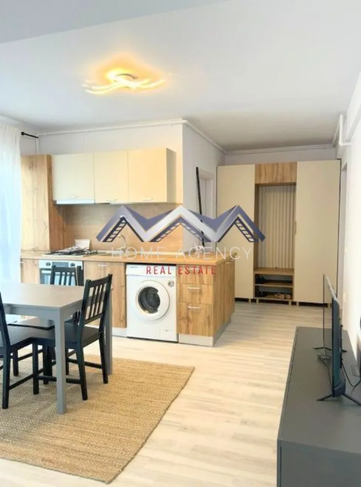 Apartament 2 camere Otopeni - Vă propunem, spre închiriere, un apartament modern și foarte cochet, complet mobilat și utilat, situat la etajul 2/3 într-un bloc nou, poziționat excelent în Otopeni, cu acces rapid către DN1, Centură, Aeroport și toate punctele de interes din zonă.

✨ Detalii apartament:
- Living cu bucătărie open space, luminos, cu acces direct către balcon
- Dormitor confortabil, perfect pentru relaxare
- Baie modernă, dotată cu duș walk-in
- Hol generos, ideal pentru spații de depozitare
- Totul este impecabil, ca nou
- 1 loc de parcare inclus în preț
- Stație de autobuz în fața complexului

Apartamentul este amenajat cu atenție la detalii, oferind un ambient cald, modern și funcțional. Perfect pentru o persoană sau un cuplu care își dorește confort, liniște și o locație excelentă.

📞 Contactează-mă pentru detalii sau pentru a programa o vizionare!
