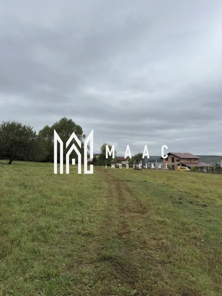 Teren intravilan 5.017 mp in Cisnadie, Sibiu - MAAC Imobiliare vă propune spre vânzare un teren intravilan cu suprafața de 5.017 mp, situat în Cisnădie, județul Sibiu, într-o zonă cu potențial ridicat de dezvoltare și acces facil către principalele puncte de interes din localitate.

Proprietatea reprezintă o oportunitate excelentă atât pentru investiție, cât și pentru dezvoltarea unui proiect rezidențial, beneficiind de o suprafață generoasă și de utilități disponibile în apropiere.

Caracteristici teren:

* suprafață: 5.017 mp
* teren intravilan
* ideal pentru dezvoltare rezidențială sau investiție
* acces facil către drumurile principale și zona urbană

Utilități:

* apă în apropiere
* curent electric în apropiere
* gaz în apropiere

Avantaje:

* suprafață generoasă
* amplasare într-o zonă în continuă dezvoltare
* acces rapid către Sibiu și împrejurimi
* oportunitate pentru investiții pe termen lung
* posibilități multiple de valorificare a terenului

Localizare:

* Cisnădie, județul Sibiu
* zonă cu acces facil către orașul Sibiu
* apropiere de zone rezidențiale și infrastructură urbană

Pentru mai multe informații sau pentru programarea unei vizionări, vă rugăm să ne contactați specificând ID:CP2819240