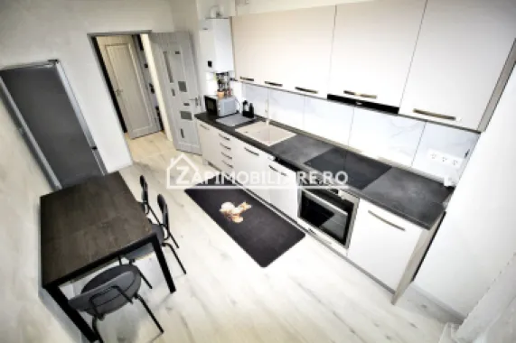 Apartament 1 camera in bloc NOU,46 mp,1 parcare privată
