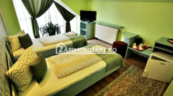 Pensiune aproape de centru,10 camere,13 băi,1 restaurant