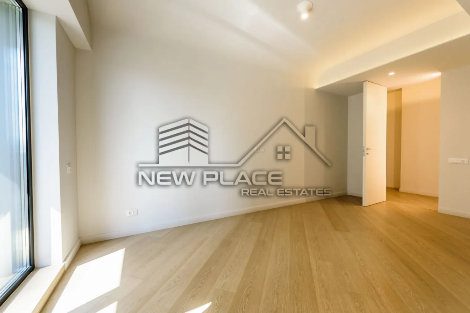 CORTINA NORTH | Model 3B | Vedere Libera | Cesiune de contract | Lux - New Place Real Estate Company va propune spre vanzare un apartament situat intr-un complex rezidential exclusivist din zona Aviatiei-Pipera si anume CORTINA NORTH. Cu o amplasare de exceptie in Nordul capitalei, acest ansamblu este unul grandios, cu caracteristici unice imbinate pentru un stil de viata complet, confortabil si activ!

Apartamentul este situat la Etajul 8 si are o suprafata construita de 96,33 mp si suprafata utila totala de 76.80 mp, are vederea libera (orientare spre Vest), fiind compus din living cu bucatarie open space, dormitor matrimonial cu baie proprie, dormitor secundar, baie de serviciu, hol si balcon.

Forma de transfer este cesiunea de contract, iar pretul apartamentului este 115,600 Eur + 5% TVA plus 95,000 Eur pentru cesiune.

Separat se poate achizitiona si un loc de parcare subteran la pretul de 20,000 Eur + TVA.

Ansamblul Cortina North completeaza stilul de viata activ, sanatos si securizat cu o gama variata de facilitati: centru fitness, bazin de inot, peste 1,5 km pista de alergare, calitatea aerului data de peste 10,000 mp de spatii verzi, galerii comerciale dedicate, parcari private subterane si supraterane si acces controlat.

FINISAJE:
- Fatada ventilata;
- Tamplarie PVC Schuco cu geam tripan termoizolant;
- Ceramica Porcelanosa;
- Obiecte sanitare Daniel Rubinetterie;
- Parchet calitate superioara;
- Usi de intrare securizate Pinum;
- Usi interioare Filomuro.

DOTARI:
- Centrala termica Ariston individuala cu gaz;
- Aer conditionat tip multisplit – Daikin;
- Videointerfon;
- Utilitati „ready to use” (racorduri individuale la gaze, curent electric, apa curenta);
- Aparatura electrica si cablaje pregatite pentru conexiunea TV si internet;
- Ascensoare – Cate doua pe fiecare tronson.

Apartamentul se ofera spre vanzare nemobilat.

Pentru mai multe detalii sau oferte similare, nu ezitati sa ne contactati.

Aceasta oferta apartine New Place Real Estate Company.