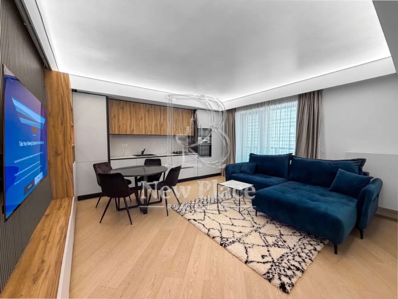 [VIDEO] CORTINA NORTH | Apartament deosebit | Parcare subterana | LUX - ✅Pentru o perspectiva mai buna asupra Apartamentului, va invitam sa vizionati Video-ul de prezentare✅

New Place Real Estate Company va propune spre inchiriere un apartament situat intr-un complex rezidential exclusivist din zona Aviatiei-Pipera si anume CORTINA NORTH. Cu o amplasare de exceptie in Nordul capitalei, acest ansamblu este unul grandios, cu caracteristici unice imbinate pentru un stil de viata complet, confortabil si activ!

Apartamentul este situat la Etajul 6, are o suprafata construita de 96.33 mp si suprafata utila totala de 78.10 mp, fiind compus din living cu bucatarie opne space de 23,70 mp, un dormitor matrimonial de 15,90 mp cu baie proprie de 4,90 mp, un al doilea dormitor de 15,00 mp - care se poate mobila la cererea viitorului chirias, baie de serviciu de 4,20 mp, hol de 5,80 mp si un balcon de 8,60 mp.

Apartamentul dispune de un loc de parcare situat la subteranul imobilului.

Ansamblul Cortina North completeaza stilul de viata activ, sanatos si securizat cu o gama variata de facilitati: centru fitness, bazin de inot, peste 1,5 km pista de alergare, calitatea aerului data de peste 10,000 mp de spatii verzi, galerii comerciale dedicate, parcari private subterane si supraterane si acces controlat.

FINISAJE:
- Fatada ventilata;
- Tamplarie PVC Schuco cu geam tripan termoizolant;
- Ceramica Porcelanosa;
- Obiecte sanitare Daniel Rubinetterie;
- Parchet calitate superioara;
- Usi de intrare securizate Pinum;
- Usi interioare Filomuro.

DOTARI:
- Centrala termica Ariston individuala cu gaz;
- Aer conditionat tip multisplit;
- Videointerfon;
- Utilitati „ready to use” (racorduri individuale la gaze, curent electric, apa curenta);
- Aparatura electrica si cablaje pregatite pentru conexiunea TV si internet;
- Ascensoare – Cate doua pe fiecare tronson.

Pentru mai multe detalii sau oferte similare, nu ezitati sa ne contactati.

Aceasta oferta apartine New Place Real Estate Company