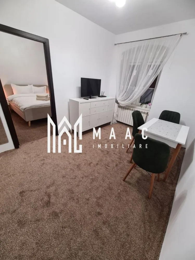 Apartament 2 Camere I 36 MPU I Pivnita I Central - MAAC Imobiliare va propune spre vanzare un apartament cochet, situat în zona centrală a Sibiului, o locație apreciată atât pentru confortul locuirii, cât și pentru potențialul investițional.

Apartamentul are o suprafață utilă de 36 mp și este amplasat la parterul unui imobil, oferind acces facil și confort sporit. Proprietatea se vinde complet mobilată și utilată, fiind pregătită pentru mutare imediată sau pentru închiriere.

În plus, apartamentul beneficiază de o pivniță generoasă de 12 mp, ideală pentru depozitare, oferind un spațiu suplimentar foarte util.

Caracteristici principale:

36 mp utili;
Parter;
Complet mobilat și utilat;
Aer condiționat;
Pivniță de 12 mp;
Zonă centrală, cu acces rapid către toate punctele de interes;
Costuri reduse de întreținere.

Avantaje: Locație centrală, foarte căutată, Acces rapid către centrul istoric, Ideal pentru închiriere pe termen lung sau regim hotelier, Investiție sigură într-o zonă cu cerere ridicată.
Datorită amplasării pe Strada Nouă, apartamentul beneficiază de toate avantajele unei poziții centrale, fiind o oportunitate excelentă pentru cei care doresc confort urban sau randament investițional.

Pentru mai multe detalii si programarea unei vizionari va rugam sa specificati ID: CP3124267.