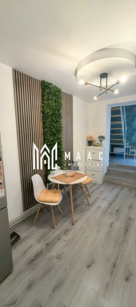 Casă individuala | 4 Camere | Gradina | 55MPU | Piața Cluj - MAAC Imobiliare vă propune spre vânzare o casă eficient compartimentată, situată în zona Piața Cluj, o locație apreciată pentru accesul rapid către centrul orașului și toate facilitățile urbane.

Caracteristici principale:
Suprafață utilă: 55 mp
Regim de înălțime: Parter + Etaj
Deschidere la stradă: 12 ml
Curte proprie
Cotă parte din curte comună
În curte mai există un singur vecin

Compartimentare:
Parter:
Living
Dormitor
Baie
Hol

Etaj:
2 dormitoare
Dressing / spațiu pentru depozitare

Localizare
Situată în zona Piața Cluj, proprietatea beneficiază de acces facil către centrul istoric, magazine, școli, grădinițe, farmacii și mijloace de transport în comun.

Pentru mai multe detalii și programarea unei vizionări, vă rugăm să contactați echipa MAAC Imobiliare și să menționați ID-ul proprietății: CP3111554.