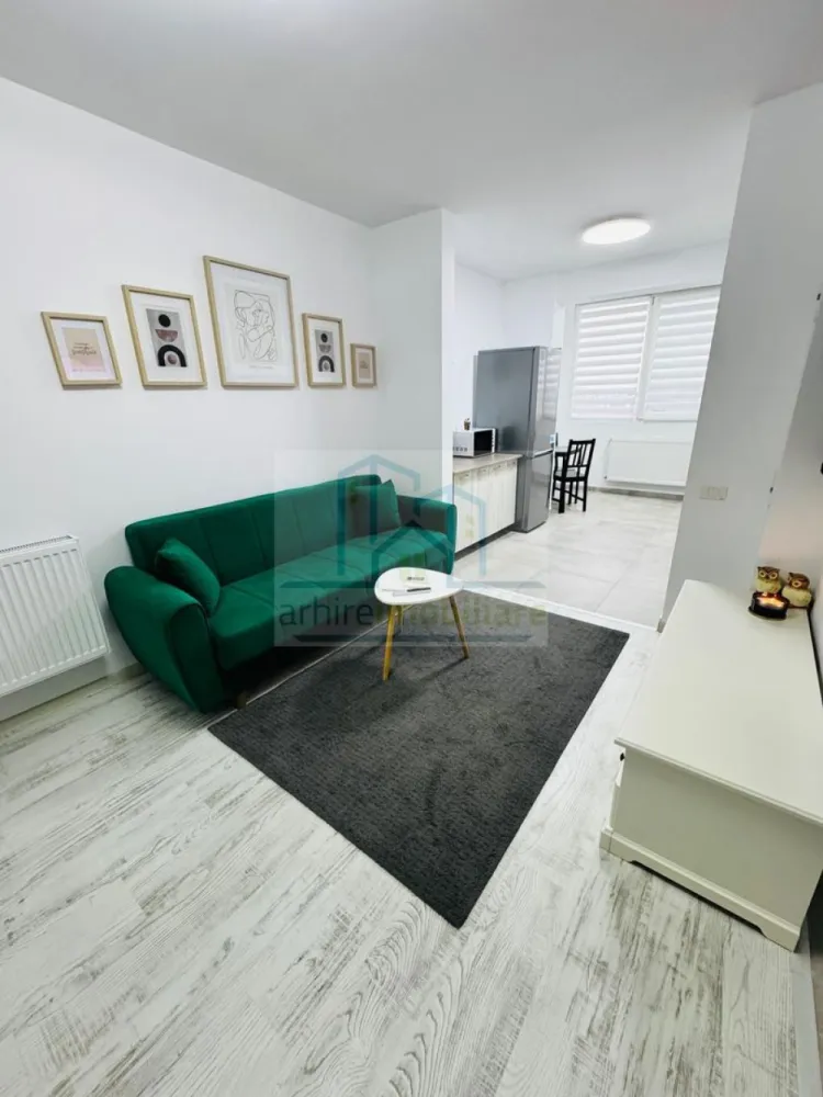 Apartament 2camere open space Popesti Leordeni, strada Biruintei - Agentia ArhireImobiliare va ofera spre vanzare un apartament cu 2 camere tip studio, apartamentul este situat la etajul 6 din 6 , finalizare bloc anul 2024, lift modern. 
Apartamentul beneficiaza de balcon inchis in termopan , cetrala proprie, aer conditionat ,plita pe gaz, cuptor electric,masina de spalat, frigider cuptor cu microunde, tv smart. Toate sunt achizitionate noi.
La parterul blocului regasim ciorbarie, Studio pilates, cafenea tip to go , frizerie , parc privat.
In imediata apropriere gasim magazine mixte ,mega image, carrefour express, penny ,parc public, restaurante, Sali de fitness, piscina.
La o distanta de maxim 5-6 minute se regaseste campusul format din cresa, gradinita si scoala toate fiind de stat.
Distanta pana la metrou este de aproximativ 12-15 minute de mers pe jos. Vizavi de campus se regaseste statia de autobuz ce face legatura cu metrou Berceni. 

Apartamentul se vinde complet mobilat si utilat

Mutare imediata.

Pretul de vanzare este de 82500 Euro Usor Negociabil .

Va asteptam la vizionare