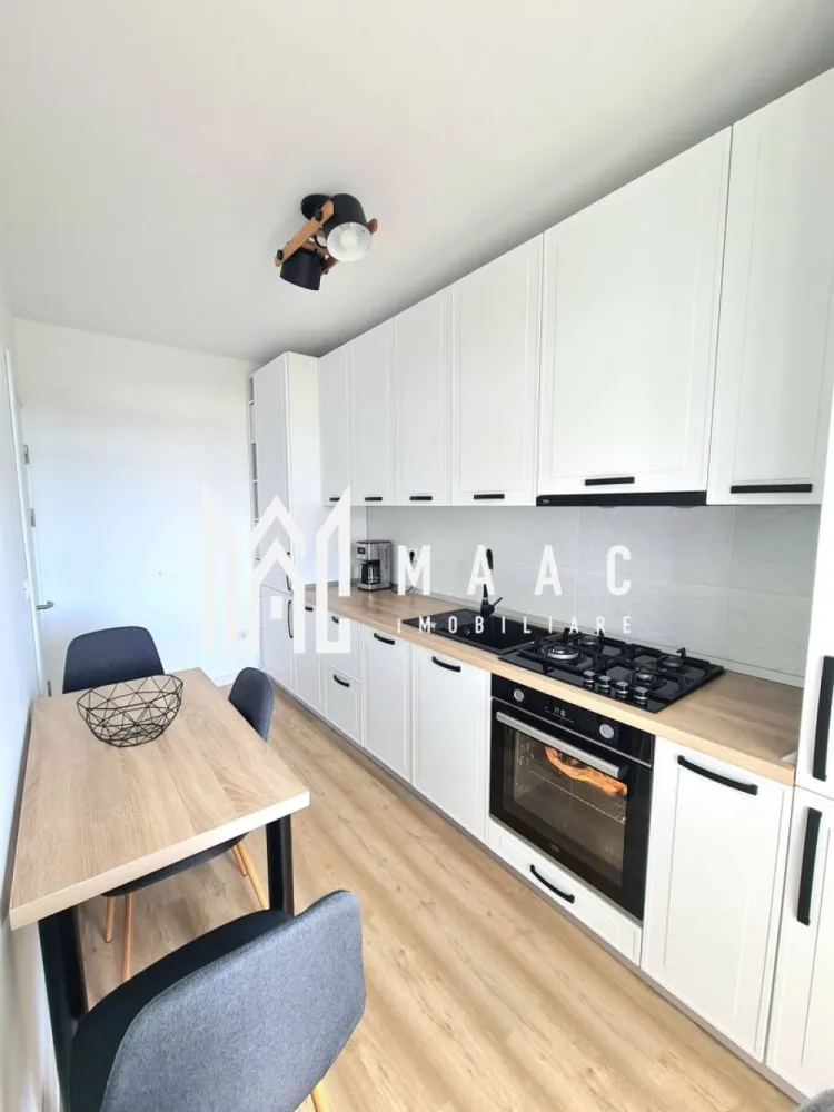 Apartament 2 Camere | Dressing | 2 Balcoane | Etaj 1 - MAAC Imobiliare vă propune spre vânzare un apartament modern și bine compartimentat, situat la etajul 1 al unui imobil prevăzut cu lift.

Caracteristici principale
Etaj 1 din 4
Imobil dotat cu lift
2 balcoane
Loc de parcare inclus în acte
Boxă la subsol

Compartimentare și dotări
Living
Bucătărie separată, complet mobilată și utilată
Dormitor cu pat matrimonial
Cameră amenajată ca dressing, cu mobilier realizat la comandă
Baie complet utilată
Plită pe gaz
Cuptor electric

Avantaje și beneficii
Loc de parcare inclus
Spații suplimentare pentru depozitare prin boxa de la subsol

Localizare
Apartamentul este amplasat într-o zonă cu acces facil către magazine, mijloace de transport, unități de învățământ și alte puncte de interes, oferind confort și accesibilitate pentru viitorii proprietari.

Pentru mai multe detalii și programarea unei vizionări, vă rugăm să contactați echipa MAAC Imobiliare și să menționați ID-ul proprietății: CP3129131.