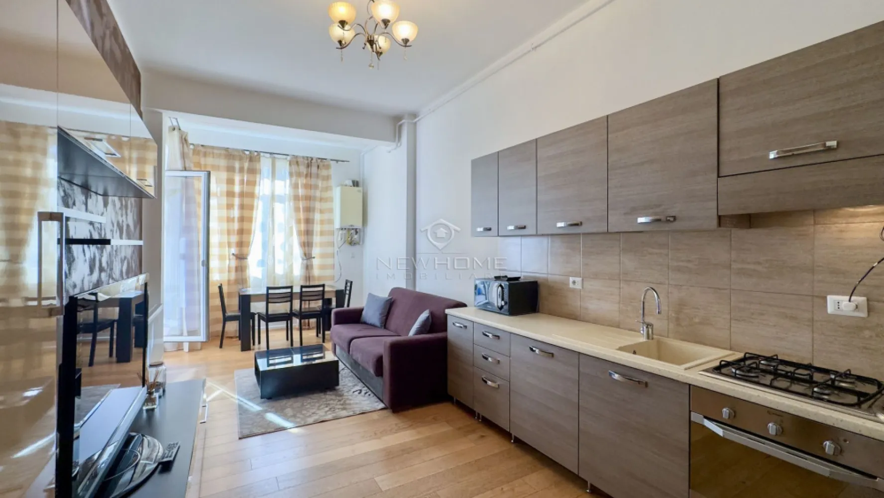 Apartament 2 camere, 55mp, zona Centru Str Traian - NewHome Imobiliare ofera in EXCLUSIVITATE spre inchiriere un apartament modern cu 2 camere semidecomandate, dispune de suprafata utila de 55 mp + 5 mp balcon. Situat la parterulunui unui imobil NOU cu 5 etaje (complexul Traian Residence) construit in anul 2018. Apartamentul este compus din: hol, living open-space impreuna cu bucataria, dormitor, balcon, baie. Pentru confortul Dvs. apartamentul se inchiriaza complet mobilat si utilat, dotat cu, centrala termica propri. Avand in vedere poziția si avantajele zonei este una de mare interes, in apropiere ceentru, mijloace de transport, magazine, farmacii, bănci, etc. Pentru mai multe informatii sau pentru a programa o vizionare contactați-ne cu încredere.