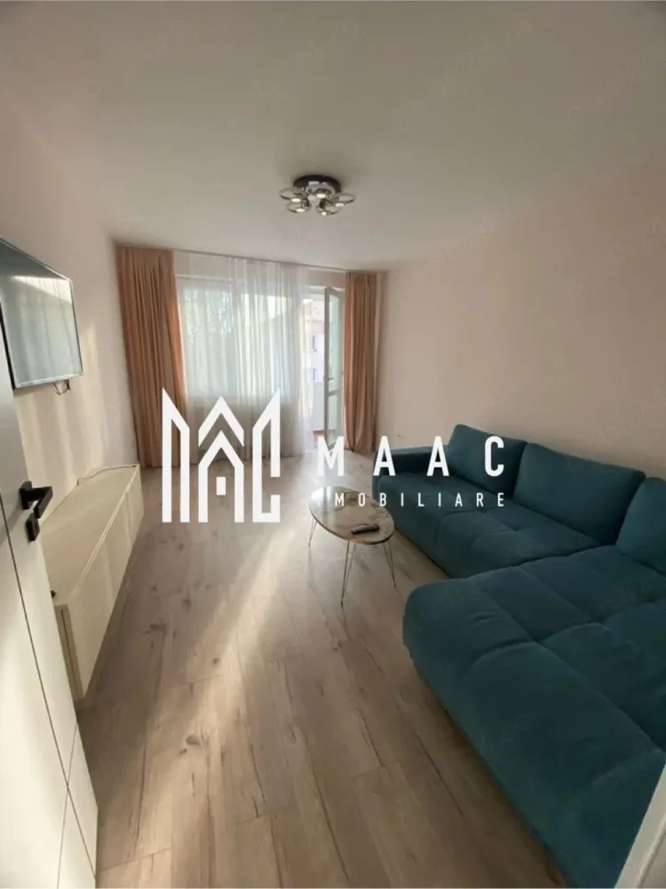 Apartament 2 camere decomandat | Hipodrom 1, Sibiu | 50 mp, balcon, etaj 4 - Apartament cu 2 camere decomandat, 50 mp utili, în Hipodrom 1, Sibiu, disponibil la închiriere cu 430 €/lună. Locuința este situată la etajul 4 și se predă complet mobilată și utilată, cu mutare imediată.

Detalii proprietate:
• Suprafață utilă: 50 mp, suprafață construită: 60 mp
• 2 camere, 1 dormitor, 1 baie, 1 bucătărie
• Compartimentare decomandată, confort 1.
• Etaj 4 din 4, imobil construit în 1991.
• 1 balcon acoperit.
• Finisaje moderne.
• Centrală termică proprie.
• Mașină de spălat rufe, mașină de spălat vase, frigider și cuptor cu microunde
• Două televizoare.
• Complet mobilat și complet utilat.

Zona Hipodrom I oferă acces facil către Lidl, farmacii, supermarketuri, mijloace de transport și alte facilități necesare pentru traiul de zi cu zi.
Pentru detalii suplimentare și programarea unei vizionări, contactați consultantul MAAC Imobiliare. Cod anunț CP3170453.