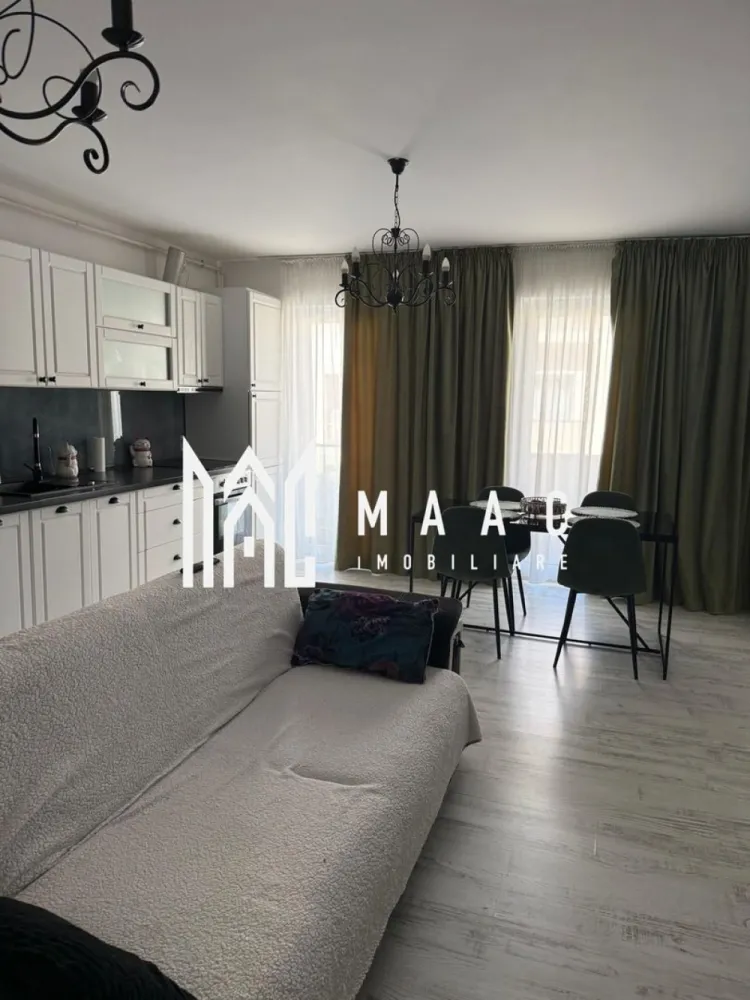 Apartament 3 camere | Sibiu Central | 64 mp, ultrafinisat - Apartament cu 3 camere, ultrafinisat, în zona Central din Sibiu, pe Calea Gusteriței, la etajul 3 din 4, cu 64 mp utili, terasă și două balcoane. O locuință modernă, luminoasă și bine organizată, pregătită pentru mutare imediată.

Detalii proprietate:
• Suprafață utilă: 64 mp
• Compartimentare: 3 camere, 2 băi, 1 bucătărie
• Etaj: 3 din 4
• An construcție: 2020
• Confort: Lux
• Stare interioară: ultrafinisat
• 1 loc de parcare
• 2 balcoane și o terasă de 12 mp
• Imobil cu lift
• Mobilat complet

Context și amplasare:
Proprietatea este situată în Sibiu, pe Calea Gusteriței, în zona Central, într-un imobil modern finalizat în 2020. Accesul este facil către punctele de interes din oraș, iar configurația apartamentului oferă spațiu util și funcționalitate pentru locuire de zi cu zi.

Pentru mai multe detalii sau pentru programarea unei vizionări, vă stăm cu drag la dispoziție. Cod anunț CP3173575. Contactați-ne pentru o vizionare și pentru informații suplimentare.