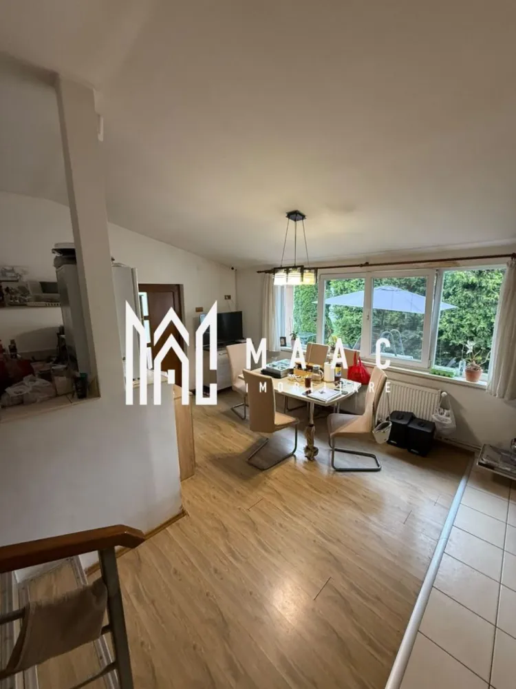 Casă de vânzare 3 camere | Lupeni, Sibiu | 141 mp utili, teren 676 mp - Casă individuală cu 3 camere în cartierul Lupeni din Sibiu, cu 141 mp utili și teren de 676 mp. Proprietatea oferă 2 băi, balcon și acces din două străzi.

Detalii proprietate:
• Casă individuală cu 3 camere, 2 dormitoare, 2 băi și 1 bucătărie
• Suprafață utilă: 141 mp
• Suprafață teren: 676 mp
• Balcon: 1
• An finalizare extindere: 2009
• Parterul include living, hol de acces, baie și bucătărie
• Etajul include 2 dormitoare, baie și balcon pe latura din spate
• Pod și pivniță pentru spații auxiliare
• Construcție cu placă de beton între niveluri; parter din cărămidă, etaj din BCA
• Izolație exterioară de 10 cm
• Centrală termică pe gaz cu calorifere, șemineu și panouri fotovoltaice
• Aer condiționat într-unul dintre dormitoare

Localizare și amplasare:
Proprietatea este situată pe Strada Teilor, în cartierul Lupeni din Sibiu, într-o zonă liniștită. Terenul are deschidere la stradă pe ambele laturi, cu front stradal de aproximativ 10 metri atât în partea din față, cât și în partea din spate.

Cod anunț CP3167574. Contactați-ne pentru o vizionare și pentru detalii suplimentare despre această proprietate.