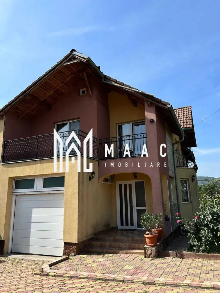 Casa de vanzare | Zona Straubing | Panouri fotovoltaice | 2 centrale | - MAAC Imobiliare vă propune spre vânzare o casă deosebită, excelent compartimentată, situată într-o zonă liniștită și căutată din cartierul Goranu, pe strada Straubing. Proprietatea este ideală pentru o familie care își dorește confort, independență energetică și spații generoase pentru relaxare.
Configurație inteligentă: Încăperi luminoase, optimizate pentru a oferi confort și intimitate.
Zone de relaxare: Terase spațioase, ideale pentru cafeaua de dimineață sau seri liniștite.
Curte amenajată: Foișor primitor pentru agrement, perfect pentru grătare și întâlniri cu prietenii.
Parcare: Garaj propriu, oferind siguranță pentru mașina dumneavoastră și spațiu suplimentar de depozitare.
Proprietatea este proiectată pentru costuri minime de întreținere și confort termic absolut, dispunând de:
Sistem hibrid de încălzire: Două centrale termice funcționale (o centrală pe gaz și o centrală pe combustibil solid).
Energie verde: Panouri fotovoltaice gata instalate, care reduc considerabil facturile de energie electrică.
Casa se află pe strada Straubing, în Goranu, o zonă curată și aerisită, cu acces rapid către principalele puncte de interes ale orașului.

Pentru mai multe detalii, fotografii suplimentare sau pentru a programa o vizionare, contactați cu încredere echipa MAAC Imobiliare, specificand ID 3177581