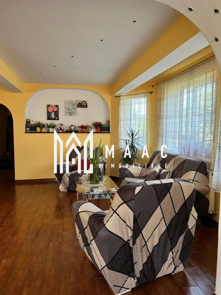 Casa de vanzare | Zona Straubing | Panouri fotovoltaice | 2 centrale | - MAAC Imobiliare vă propune spre vânzare o casă deosebită, excelent compartimentată, situată într-o zonă liniștită și căutată din cartierul Goranu, pe strada Straubing. Proprietatea este ideală pentru o familie care își dorește confort, independență energetică și spații generoase pentru relaxare.
Configurație inteligentă: Încăperi luminoase, optimizate pentru a oferi confort și intimitate.
Zone de relaxare: Terase spațioase, ideale pentru cafeaua de dimineață sau seri liniștite.
Curte amenajată: Foișor primitor pentru agrement, perfect pentru grătare și întâlniri cu prietenii.
Parcare: Garaj propriu, oferind siguranță pentru mașina dumneavoastră și spațiu suplimentar de depozitare.
Proprietatea este proiectată pentru costuri minime de întreținere și confort termic absolut, dispunând de:
Sistem hibrid de încălzire: Două centrale termice funcționale (o centrală pe gaz și o centrală pe combustibil solid).
Energie verde: Panouri fotovoltaice gata instalate, care reduc considerabil facturile de energie electrică.
Casa se află pe strada Straubing, în Goranu, o zonă curată și aerisită, cu acces rapid către principalele puncte de interes ale orașului.

Pentru mai multe detalii, fotografii suplimentare sau pentru a programa o vizionare, contactați cu încredere echipa MAAC Imobiliare, specificand ID 3177581