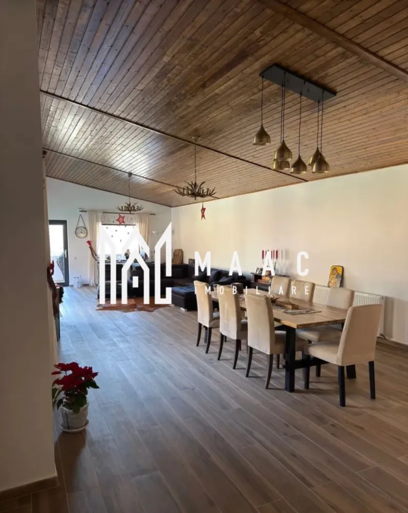 Casă individuală 5 camere | Tocile, Sadu | 250 mp utili, teren 1900 mp - Casă individuală cu 5 camere în Tocile, Sadu, finalizată în 2025, cu 250 mp utili și teren de 1.900 mp. Proprietatea se vinde complet mobilată și utilată, cu finisaje moderne, terasă și curte amenajată, fiind pregătită pentru mutare imediată.

Detalii proprietate:
• Suprafață utilă: 250 mp
• Suprafață construită: 350 mp
• Teren: 1.900 mp
• Compartimentare: living, bucătărie, 4 dormitoare, 5 băi, cameră tehnică și spații de depozitare
• Regim de înălțime: parter, imobil cu 1 nivel
• Construcție finalizată în 2025
• Stare interior: finisat modern
• Se vinde complet mobilată și utilată
• Încălzire în pardoseală în întreaga locuință
• Terasă, balcon, curte amenajată și 1 loc de parcare

Zona Tocile oferă liniște, aer curat și acces rapid către Sibiu, într-un cadru natural potrivit pentru locuire permanentă. Amplasarea la poalele munților completează atmosfera retrasă și intimitatea proprietății.

Cod anunț CP3148342. Contactați-ne pentru detalii suplimentare și pentru programarea unei vizionări.