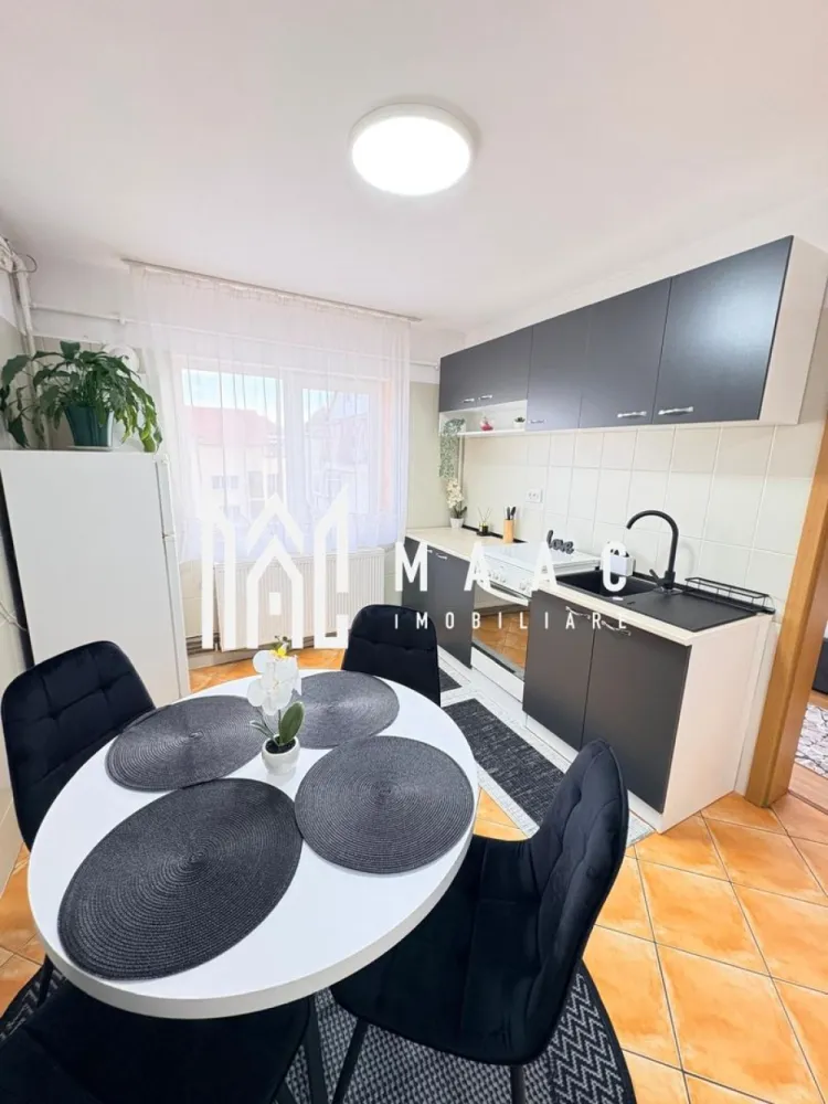 Apartament 2 camere | Intabulat | Renovat complet | Turnisor - MAAC Imobiliare vă prezintă spre vânzare un apartament de 2 camere, complet renovat și mobilat, situat în cartierul Turnișor, într-o zonă cu acces facil către toate punctele de interes.

Caracteristici generale:
Apartament cu 2 camere
Suprafață utilă: 42 mp
Complet renovat
Complet mobilat și utilat
Centrală termică nouă
Se vinde exact ca în poze, cu tot mobilierul și electrocasnicele incluse.

Compartimentare:
La intrarea în apartament ne întâmpină bucătăria
Bucătăria este complet mobilată și utilată cu aragaz, cuptor și plită
Primul dormitor este complet echipat, având pat, TV și birou, iar al doilea dormitor este similar. 
Ambele beneficiaza de un mic balcon de tip frantuzesc.
Baia este dotată cu cadă și mașină de spălat rufe.

Dotări și confort:
Încălzire prin calorifere
Centrală termică proprie, nouă
Amenajare modernă, funcțională, gata de mutare imediată.

Zonă și facilități:
Zonă foarte bine conectată
În apropiere se regăsesc bănci, stații de autobuz, magazine și alte facilități necesare zilnic

Avantaje:
Ideal pentru locuit sau investiție
Nu necesită nicio investiție suplimentară
Disponibil imediat.

Pentru mai multe detalii precizati telefonic ca ati vazut anuntul cu ID: CP2900167