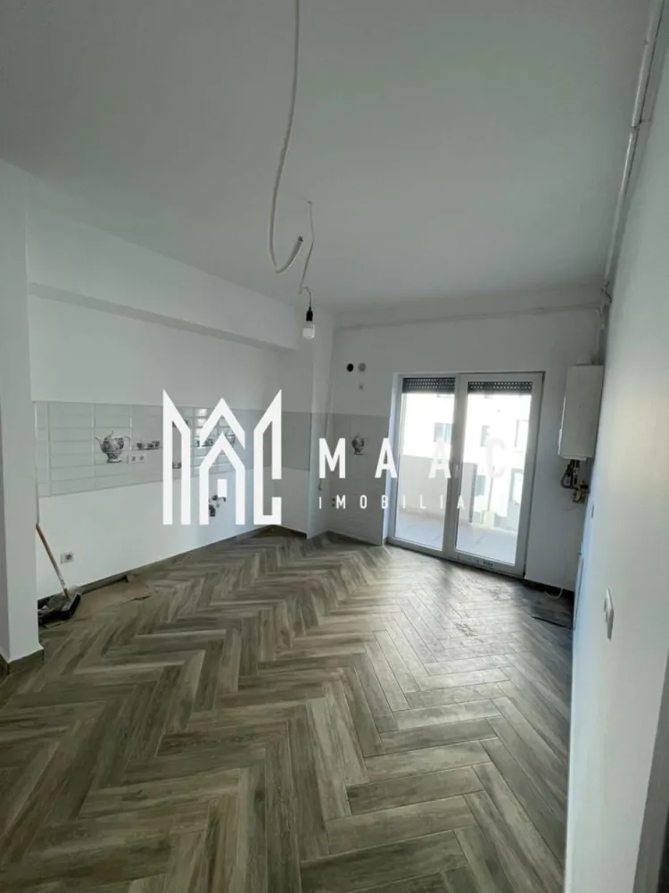 Apartament 2 camere | Etaj1 | Balcoane | Parcare | D.Stanca - MAAC Imobiliare vă prezintă spre vânzare un apartament modern cu 2 camere, situat la etajul 1, în zona Doamna Stanca.

Caracteristici:
Suprafață utilă: 61 mp, decomandat
Compartimentare: hol de intrare, bucatarie separata cu iesire pe unul din cele 2 balcoane, living cu iesire in al doilea balcon, dormitor si baie dotata cu cada si geam de aerisire.
Etaj: 1
An construcție: 2023
Bloc izolat termic, dotat cu lift.

Dotări și finisaje:
Centrală termică proprie
Încălzire prin pardoseală
Ferestre PVC cu geam termopan
Ușă metalică la intrare
Pereți finisați cu vopsea lavabilă
Jaluzele electrice

Parcare și acces:
1 loc de parcare inclus
Parcare subterană, cu acces securizat pe bază de cartelă

Avantaje:
Construcție nouă
Zonă foarte bine conectată, aproape de Dedeman, Mega Image, mijloace de transport și magazine
Ideal pentru locuit sau investiție.

Pentru mai multe detalii precizati telefonic ca ati vazut anuntul cu ID: CP2900251