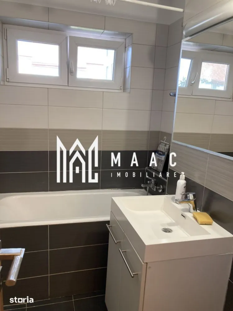 Apartament 2 camere | Etaj 3 | Balcon | Zona Rahovei - MAAC Imobiliare vă propune spre închiriere un apartament modern cu 2 camere, situat în cartierul Hipodrom I, zona Rahovei, una dintre cele mai căutate zone rezidențiale din Sibiu, datorită accesului facil către centre comerciale, școli, mijloace de transport și centrul orașului.

Detalii proprietate
Suprafață utilă: 47 mpu
Balcon: 7 mp
Etaj: 3 din 4
Compartimentare: semidecomandată
Disponibil imediat
Compartimentare
Living luminos
Dormitor
Bucătărie închisă
Baie cu cadă și geam de aerisire
Debara pentru depozitare
Balcon generos
Dotări și beneficii
Complet mobilat și utilat
Aer condiționat
Mașină de spălat rufe
Bucătărie mobilată și echipată
Baie cu ventilație naturală
Debara spațioasă
Apartament renovat recent
Prima închiriere după renovare
Avantaje locație

Aproape de magazine, supermarketuri și farmacii
Stații de autobuz în imediata apropiere
Acces rapid către școli și grădinițe
Conexiune facilă către centrul orașului
Zonă liniștită și bine dezvoltată
Condiții de închiriere
Contract minim 12 luni
Garanție: echivalentul unei chirii lunare
Nu se acceptă animale de companie
Posibilitate de prelungire a contractului

Pentru detalii și vizionare, contactați-ne și menționați codul CP3181544