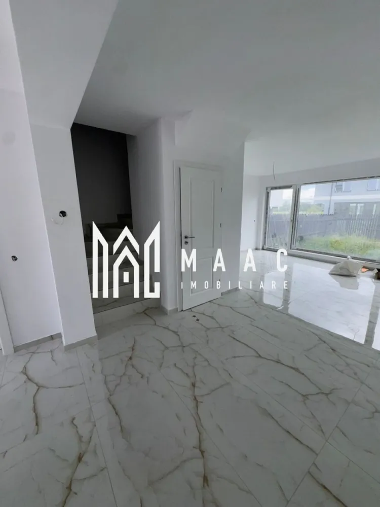 CASA NOUA I 4 CAMERE I 127 MP - Maac Imobiliare ofera spre vanzare casa noua, moderna si spatioasa, situata intr-o zona linistita, foarte aproape de oras

Locuinta este compartimentata eficient si dispune de :
- living generos open space cu bucatarie
- 3 dormitoare
- 2 bai
- dressing
- balcon 7.5 mp

Proprietatea este ideala pentru o familie care isi doreste confort, liniste si acces rapid catre oras

Pentru mai multe detalii si stabilirea unei vizionari anuntati telefonic CP3180961