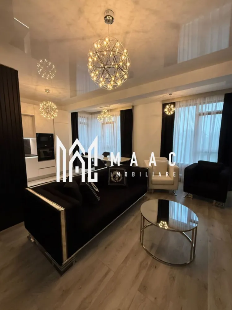 Apartament 2 camere de vânzare | Șelimbăr, Sibiu | 62 mp, mobilat, balcon - Apartament cu 2 camere de vânzare în Șelimbăr, zona Doamna Stanca, cu 62 mp utili, situat la etajul 2 al unui imobil finalizat în 2022, potrivit pentru mutare imediată.

Detalii proprietate:
• Suprafață utilă: 62 mp
• Compartimentare: dormitor matrimonial, living cu bucătărie open-space, baie cu geam pentru ventilație naturală, hol și balcon
• Etaj 2 din 3
• Imobil finalizat în 2022
• Structură din cărămidă
• Apartamentul se vinde mobilat și utilat
• Balcon potrivit pentru relaxare
• Baie cu geam pentru aerisire naturală

Locuința este amplasată în zona Doamna Stanca, cu acces rapid către centre comerciale, instituții de învățământ, farmacii, mijloace de transport și alte puncte de interes din zonă.

Pentru detalii suplimentare și programarea unei vizionări, contactați echipa MAAC Imobiliare și menționați Cod anunț CP3186815.