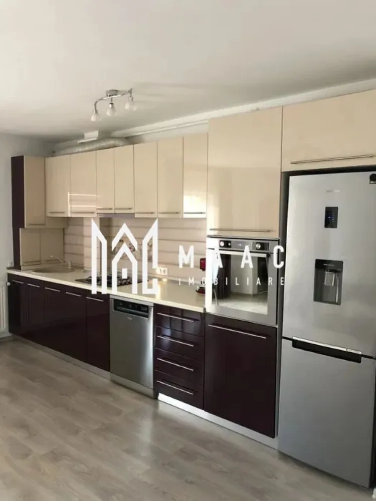 Apartament 2 camere | Parter | Decomandat | 56 MP | Selimbar - MAAC Imobiliare oferă spre vânzare un apartament modern cu 2 camere, situat la parterul unui imobil nou, amplasat într-o zonă liniștită din Șelimbăr.

Caracteristici:
Apartament cu 2 camere, compartimentare decomandată.
Situat la parterul unui imobil cu regim de înălțime P+3.
Construcție nouă, cu finisaje de bună calitate.

Compartimentare:
Hol de acces.
Living cu bucătărie open space.
Dormitor.
Baie dotată cu geam pentru aerisire naturală.

Dotări și stare:
Apartamentul se vinde complet mobilat și utilat.
Finisaje bine întreținute.
Locuință pregătită pentru mutare imediată, fără investiții suplimentare.

Localizare și avantaje:
Acces facil către magazine, supermarketuri și spații de joacă pentru copii.
Conectare rapidă către municipiul Sibiu.

Parcare
Loc de parcare aferent proprietății.

Pentru mai multe detalii, vă rugăm sa ne contactați, specificand ID: CP2905218