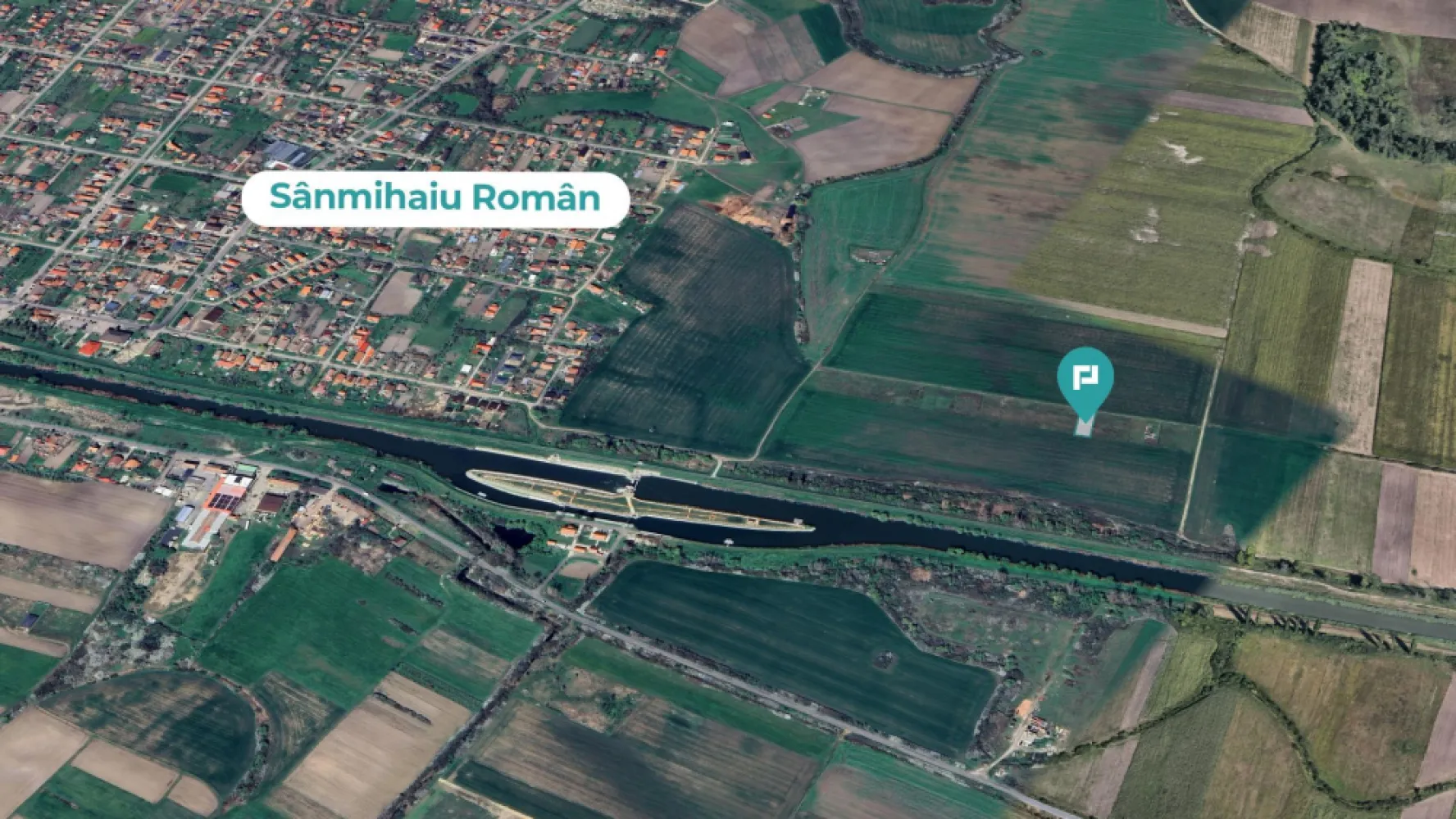Teren intravilan Sanmihaiu Roman - De vânzare teren intravilan – Sanmihaiu Român
Oportunitate excelentă de investiție!

Vă propunem spre vânzare un teren intravilan situat în localitatea Sânmihaiu Român, ideal pentru construcții rezidențiale. Terenul se află într-o zonă liniștită, cu acces facil către Timișoara și beneficiază de toate avantajele unei comunități în plină dezvoltare.

 Caracteristici:
- Suprafață: 665 mp 
- Destinație: Curți – construcții 
- Front stradal: 18 metri 
- Teren drept, poziționat excelent 
- Utilități în apropiere 

Terenul este ideal pentru construirea unei case familiale sau pentru investiție în vederea dezvoltării unui proiect rezidențial.

Pentru mai multe informații sau programarea unei vizionări, nu ezitați să mă contactați:

Pentru mai multe informații sau pentru a programa o vizionare, nu ezitați să mă contactați,
Daniela Ianc - Consultant Imobiliar PropertyLab Timișoara
Telefon: 0722375289

Mail: daniela.ianc@propertylab.ro
Cod Proprietate: CP2582518