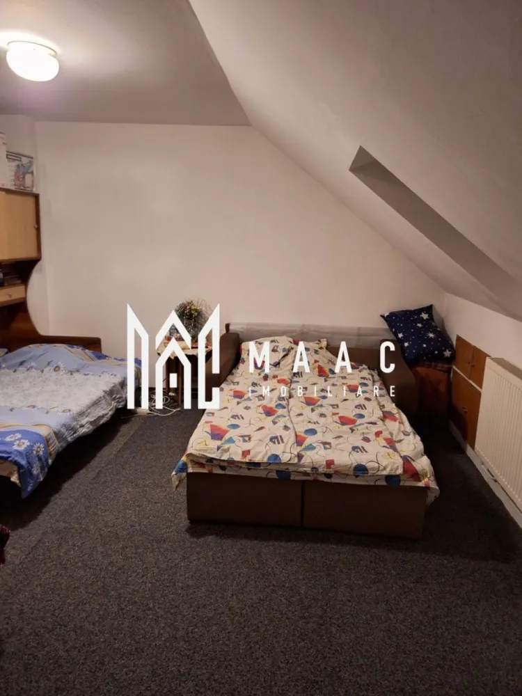 Apartament 2 camere I Decomandat I Zona Valea Aurie - Se oferă spre vânzare un apartament tip mansardă, situat la etajul 5, într-un imobil cu regim de înălțime P+4+M, amplasat în zona Valea Aurie, una dintre cele mai apreciate zone rezidențiale din Sibiu.

Apartamentul are o suprafață utilă de 46, mp, la care se adaugă un balcon de 3,6 mp, și beneficiază de o priveliște panoramică spectaculoasă asupra orașului și către pădure.

Compartimentare:
Primul nivel:
Hol de intrare
Living cu bucătărie tip open-space
Baie
Balcon
Al doilea nivel:
Dormitor spațios

Alte detalii:
Apartament intabulat integral
Distribuit pe două niveluri
Luminos și bine compartimentat

Se vinde complet mobilat și utilat, exact ca în fotografiile de prezentare
Ideal pentru locuință proprie sau investiție

Zona oferă liniște, aer curat și acces rapid către punctele de interes ale orașului, fiind potrivită pentru cei care își doresc confort și priveliște într-un cadru natural.

Pentru mai multe detalii sau programarea unei vizionări, nu ezitați să ne contactați specificand ID: CP2900656