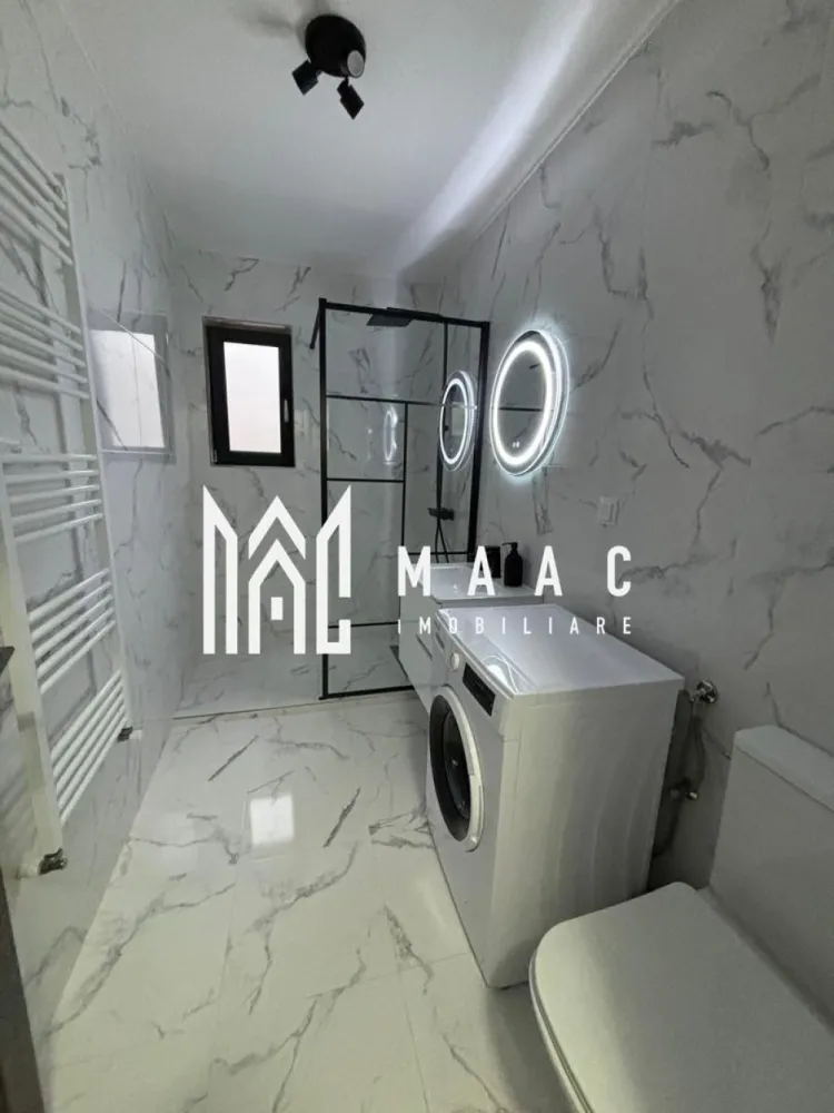 Aparatament 2 camere | Zona Doamna Stanca | 52 mp| - MAAC Imobiliare vă propune spre vânzare un apartament cu 2 camere, situat într-una dintre cele mai căutate zone din Sibiu – Doamna Stanca. Proprietatea este amplasată la un etajul 3 bloc cu acoperis, oferind un echilibru ideal între confort și eficiență termică.

Locuința dispune de o compartimentare practică și luminoasă, fiind compusă din living spațios cu bucătărie inchisa dormitor matrimonial, baie modernă și balcon. Apartamentul se vinde complet mobilat și utilat, cu un design contemporan, atent ales pentru a oferi un ambient plăcut și funcțional.

Finisajele sunt de calitate superioară, incluzând pardoseli moderne, tâmplărie PVC cu geam termopan și obiecte sanitare premium. Totodată, proprietatea beneficiază de un loc de parcare inclus în preț, un avantaj important în zonă.

Zona Doamna Stanca este apreciată pentru accesul facil către centre comerciale, mijloace de transport și alte puncte de interes, fiind ideală atât pentru locuit, cât și pentru investiție.

Pentru mai multe detalii sau programarea unei vizionări, vă stăm cu drag la dispoziție! Specificati CP3191185