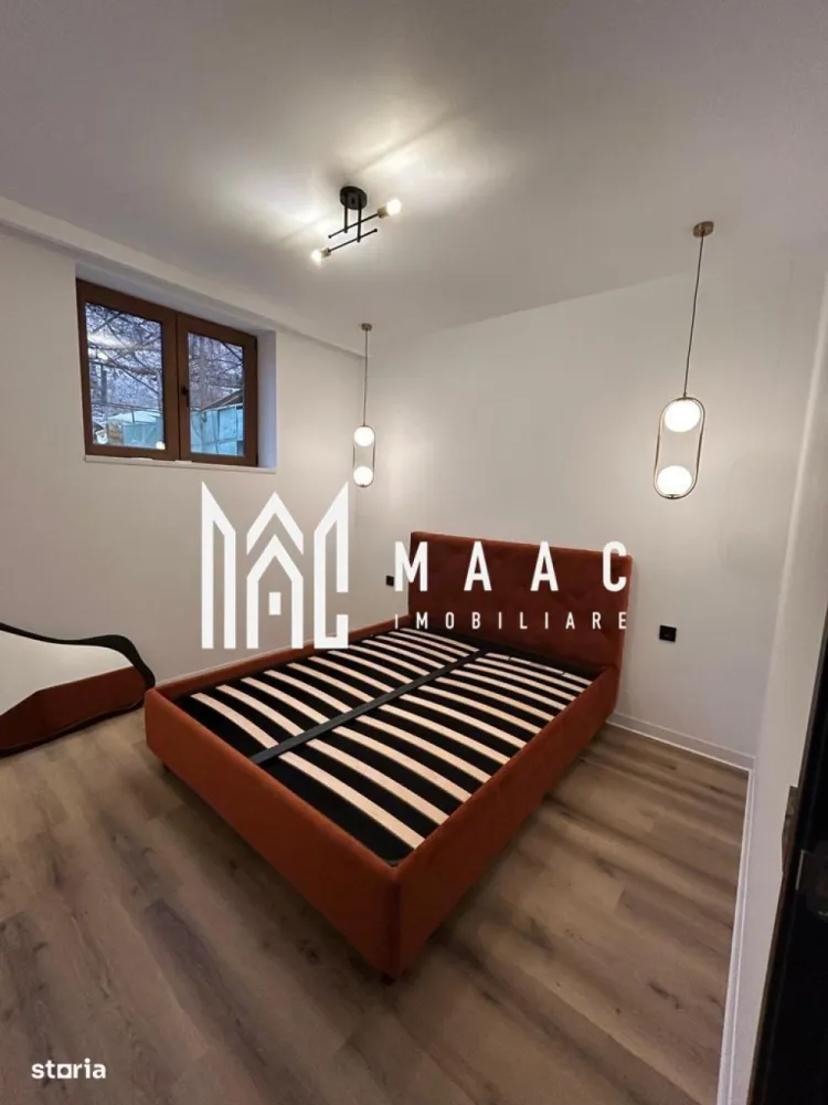 Apartament 2 camere | 50 MPU | Investitie | Ultracentral - MAAC Imobiliare vă propune spre vânzare un apartament exclusivist, situat în zona ultracentrală a Sibiu.
Locuința are o suprafață utilă de 50 mp și beneficiază de acces la o curte comună în suprafață totală de 277 mp, din care cota parte aferentă proprietății este de 109 mp. În plus, apartamentul dispune de pod în suprafață de 45 mp, existând posibilitatea de mansardare în baza unui proiect, ceea ce oferă un potențial real de extindere și valorificare.

Proprietatea este elegant compartimentată astfel:

Hol de acces

Două dormitoare

Living cu bucătărie open-space

Baie

Apartamentul a fost complet reconfigurat și renovat, atât la interior, cât și la exterior (finisaje moderne cu riflaj PVC), fiind predat mobilat și utilat, pregătit pentru mutare imediată sau exploatare în scop investițional.

Poziționarea ultracentrală, la doar câțiva pași de Podul Minciunilor, restaurante, obiective turistice, instituții publice, școli și zone comerciale, face ca această proprietate să fie ideală pentru:

Regim hotelier

Închiriere premium

Birou boutique

Pentru mai multe detalii și programarea unei vizionări, vă rugăm să ne contactați menționând ID: CP2922308