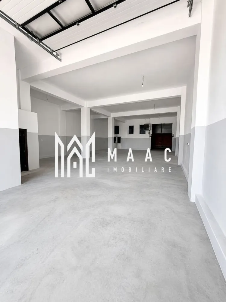 Hală industrială | 500 mp | Curte 600 mp | Zona Terezian - MAAC Imobiliare vă propune spre închiriere o hală industrială modernă, situată în zona Terezian, ideală pentru activități de producție, depozitare, logistică sau distribuție.

Suprafață totală construită: 500 mp, compartimentată astfel:
Hală industrială: 300 mp;
Spațiu de birouri la etaj: 200 mp;
Curte proprie: 600 mp, ideală pentru parcare, depozitare exterioară și manevrarea autovehiculelor.

Dotări și facilități:
Sistem fotovoltaic cu panouri solare de 50 kW;
Baterii de stocare de 25 kW;
4 grupuri sanitare;
Acces TIR;
Ușă industrială retractabilă cu dimensiuni de 4 m lățime x 4,30 m înălțime, facilitând accesul vehiculelor și utilajelor de mari dimensiuni.

Proprietatea oferă un spațiu eficient și bine compartimentat, fiind potrivită pentru o gamă variată de activități industriale și comerciale.

Pentru mai multe informații sau pentru programarea unei vizionări, vă rugăm să ne contactați, specificând ID:CP3195558