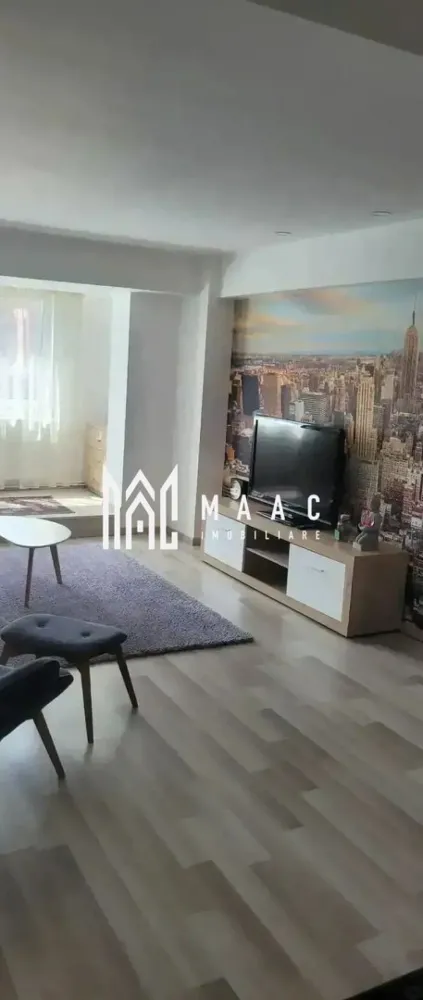 Apartament 3 camere | 80 MPU | Mobilat complet | Zona Gară - MAAC Imobiliare vă propune spre închiriere un apartament modern cu 3 camere, situat în zona Gării – una dintre cele mai conectate și accesibile zone ale Sibiului.
Proprietatea se află la etajul 1 și oferă o compartimentare practică, ideală pentru locuire confortabilă pe termen lung.

Detalii apartament:
Apartamentul are o suprafață de 80 mp utili și include un living generos, două dormitoare decomandate, două băi complet utilate și o bucătărie mobilată și utilată complet. Este dotat cu aer condiționat și se predă complet mobilat și utilat, gata pentru a fi locuit.

Beneficii:
Zonă centrală, aproape de gară și mijloace de transport
Acces rapid către centrul orașului
Apartament luminos, spațios și bine întreținut
Potrivit pentru familie, cuplu sau studenți

Pentru mai multe detalii sau pentru a programa o vizionare, vă rugăm să ne contactați.
Specificați ID-ul CP2851575.