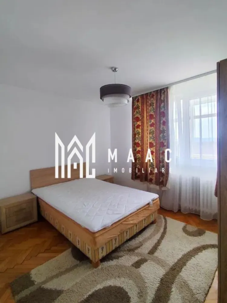 Apartament 2 camere decomandat | Hipodrom 3, Sibiu | balcon 8 mp, pivniță - Apartament cu 2 camere decomandat de închiriat în Sibiu, zona Hipodrom 3, cu 50 mp utili, balcon închis de 8 mp și pivniță de 16 mp, potrivit pentru locuire confortabilă.

Detalii proprietate:
• Suprafață utilă: 50 mp, suprafață construită: 55 mp
• Compartimentare: living, dormitor, bucătărie separată, baie, hol
• Etaj 10 din 10, imobil finalizat în 1970
• Stare interioară bună, baie renovată integral
• Balcon închis de 8 mp și pivniță de 16 mp
• Orientare Sud-Est
• Imobil cu lift modern

Localizarea pe Bulevardul Mihai Viteazul oferă acces rapid către centre comerciale, supermarketuri, farmacii, școli, restaurante, mijloace de transport în comun și principalele artere ale orașului.

Cod anunț CP3197904. Contactați echipa MAAC Imobiliare pentru detalii suplimentare și pentru programarea unei vizionări.
