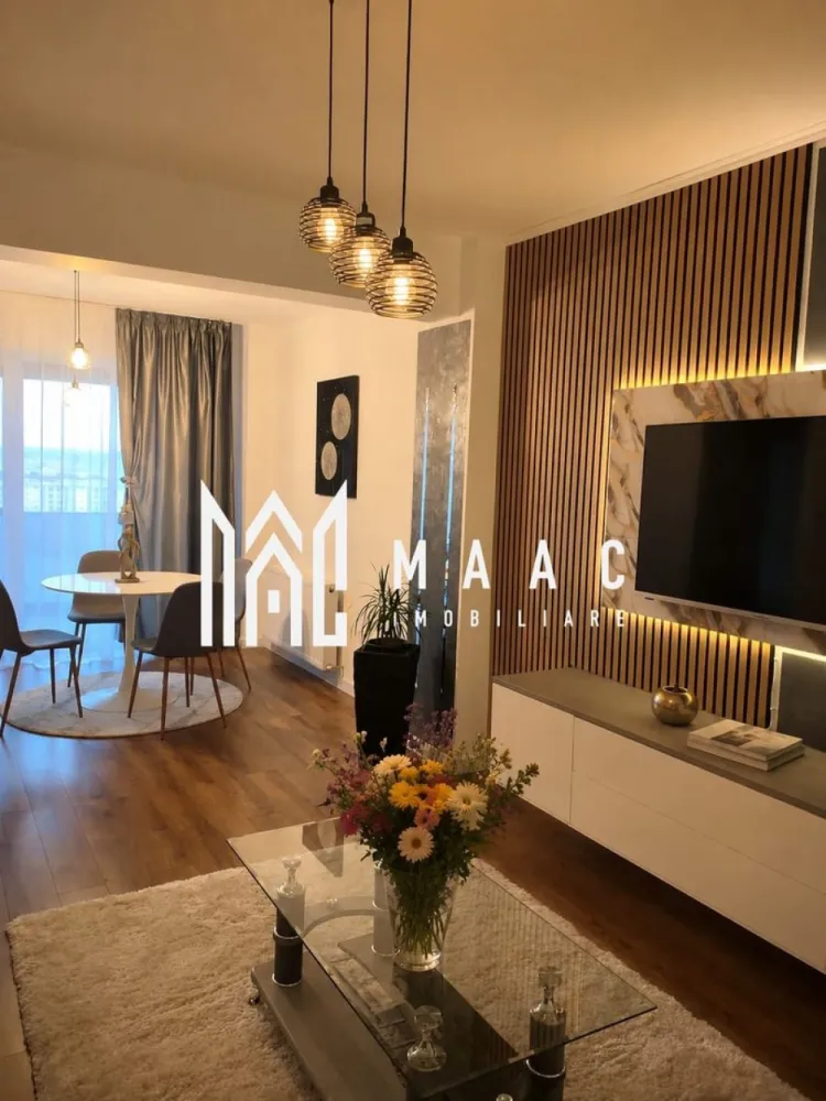 Apartament de vânzare 2 camere | Șelimbăr, Sibiu | 64 mp - Apartament de vânzare cu 2 camere în Șelimbăr, aproape de Sibiu, cu 64 mp utili, compartimentare decomandată și vedere panoramică, potrivit pentru locuire confortabilă într-un imobil construit în 2010.

Detalii proprietate:
• 64 mp utili, apartament decomandat, ultrafinisat
• Compartimentare cu 1 dormitor, 1 living, bucătărie închisă și 1 baie
• Baie cu cabină și geam pentru ventilare naturală
• Etaj 8 din 11, cu lift modern
• 1 balcon și 1 loc de parcare inclus
• Orientare Sud-Est
• Centrală termică Vaillant
• Geamuri termopan Tripan Salamander cu protecție UV
• Izolație termică cu vată minerală bazaltică de 15 cm

Poziționarea în Șelimbăr oferă acces facil către punctele de interes, iar amplasarea la etaj înalt completează apartamentul cu o priveliște panoramică deosebită. Configurația cu bucătărie închisă și finisajele existente îl fac ușor de folosit din prima zi.

Cod anunț CP3198244. Contactați-ne pentru o vizionare și pentru detalii suplimentare.