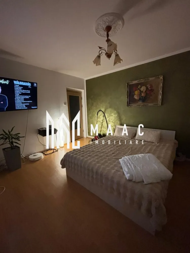 Apartament 2 camere decomandat, 48 mp utili – Bulevardul Mihai Viteazu - MAAC Imobiliare va propune spre vanzare un apartament cu 2 camere, total decomandat, cu o suprafață utilă de 48 mp, situat la etajul 4 din 5 al unui bloc bine întreținut, cu acoperiș.

Compartimentare și beneficii:
 Living luminos, cu ferestre mari ce oferă multă lumină naturală și o priveliște frumoasă asupra orașului
Dormitor spațios și confortabil
Bucătărie separată, spațioasă și luminoasă, cu finisaje moderne
 Baie cu geam pentru aerisire naturală
 Balcon generos de 5 mp
Pod de 48 mp deasupra apartamentului – ideal pentru depozitare
Se vinde complet mobilat și utilat, exact ca în fotografii

Avantaje suplimentare:
Zonă liniștită și foarte bine cotată
Bloc cu regim redus de înălțime
Compartimentare practică, fără spații pierdute
Lumină naturală din abundență

Localizare premium – Aleea Biruinței, în zona Bulevardului Mihai Viteazu, aproape de:
școli și grădinițe
facultăți
Casa de Sănătate
magazine, farmacii și mijloace de transport

Dacă îți dorești un apartament într-o zonă centrală, cu toate facilitățile la îndemână, acesta poate fi exact ceea ce cauți!

Pentru mai multe detalii si programarea unei vizionari va rugam sa specificati ID: CP2942596.