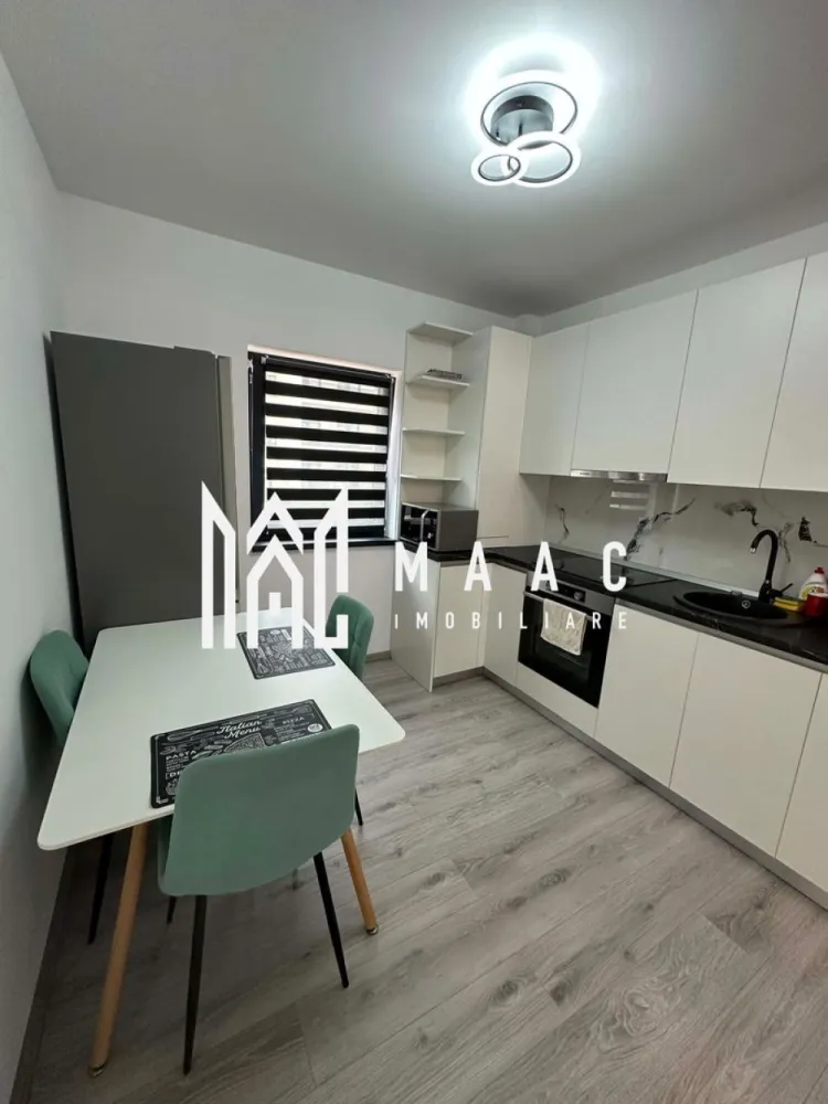 Apartament 2 camere | D-na Stanca I Gradina 38 mp, terasa - Apartament cu 2 camere decomandat în zona Doamna Stanca din Șelimbăr, situat la parterul unui imobil construit în 2021, cu balcon, terasă și loc de parcare, potrivit pentru mutare rapidă.

Detalii proprietate:
• Suprafață utilă: 56 mp
• Compartimentare interioară: decomandat, living cu iesire in gradina (38mp) printr-un balcon cu spațiu de depozitare, dormitor, bucătărie separată cu acces în terasa generoasa, hol și baie cu aerisire naturală.
• Regim de înălțime: parter din 3 etaje
• Finisat modern
• Confort 1, încălzire în pardoseală
• Se predă mobilat și utilat
• Aferent: 1 loc de parcare

Zona Doamna Stanca oferă acces rapid către Piața Rahova, Supeco și alte puncte comerciale, bancare și de învățământ. În apropiere se află stații pentru transportul în comun, iar amplasarea susține un ritm de zi cu zi practic, cu servicii utile la distanță convenabilă.

Cod anunț CP3206674. Contactați-ne pentru o vizionare și pentru toate detaliile legate de această proprietate.
