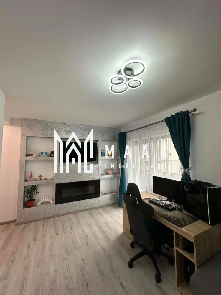 Apartament 2 camere | D-na Stanca I Gradina 38 mp, terasa - Apartament cu 2 camere decomandat în zona Doamna Stanca din Șelimbăr, situat la parterul unui imobil construit în 2021, cu balcon, terasă și loc de parcare, potrivit pentru mutare rapidă.

Detalii proprietate:
• Suprafață utilă: 56 mp
• Compartimentare interioară: decomandat, living cu iesire in gradina (38mp) printr-un balcon cu spațiu de depozitare, dormitor, bucătărie separată cu acces în terasa generoasa, hol și baie cu aerisire naturală.
• Regim de înălțime: parter din 3 etaje
• Finisat modern
• Confort 1, încălzire în pardoseală
• Se predă mobilat și utilat
• Aferent: 1 loc de parcare

Zona Doamna Stanca oferă acces rapid către Piața Rahova, Supeco și alte puncte comerciale, bancare și de învățământ. În apropiere se află stații pentru transportul în comun, iar amplasarea susține un ritm de zi cu zi practic, cu servicii utile la distanță convenabilă.

Cod anunț CP3206674. Contactați-ne pentru o vizionare și pentru toate detaliile legate de această proprietate.