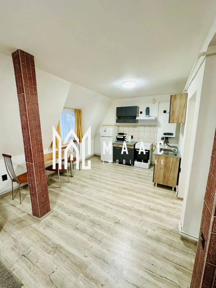 Mansardă pe două niveluri – 45 mp utili – Str. Semaforului, Vasile Aaron, Sibiu - MAAC Imobiliare va propune spre vanzare o mansardă intabulată, dispusă pe două niveluri, cu o suprafață utilă de 45 mp, situată pe strada Semaforului, în cartierul Vasile Aaron din Sibiu.
Dispunerea pe două niveluri oferă o delimitare eficientă între zona de zi și zona de odihnă, creând un spațiu aerisit și bine organizat. Mansarda este luminoasă și bine întreținută, pregătită pentru a deveni „acasă” imediat.
Apartamentul a fost renovat recent și beneficiază de următoarele îmbunătățiri: Centrală termică nouă, Geamuri termopan,Uși interioare schimbate.
Renovările oferă un plus de confort și eficiență energetică, reducând costurile de întreținere.

Avantaje locație – Totul la câțiva pași: grădiniță, școală, stație autobuz, Piață, Profi, Penny,Lidl și Shopping City Sibiu.
Zona este liniștită, cu spații verzi generoase, ideală pentru plimbări și pentru animalele de companie.

Locuința este ideală pentru o persoană tânără, un cuplu sau pentru investiție (închiriere), având o compartimentare practică și un ambient primitor.

Pentru mai multe detalii si programarea unei vizionari va rugam sa specificati ID: CP2944359.