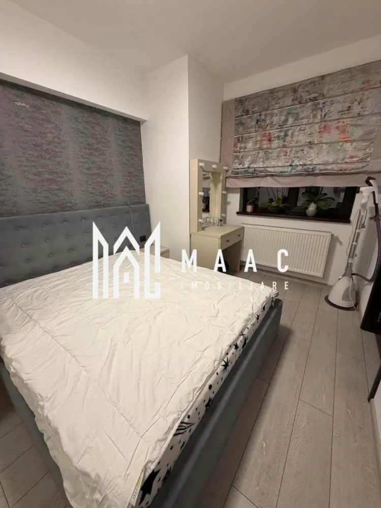 Apartament 3 camere | zona centrala | parter | 74 mp - MAAC Imobiliare vă propune spre vânzare un apartament 3 camere elegant, situat în zona centrală, Cartierul Libertății din Râmnicu Vâlcea – o locație apreciată pentru accesibilitate și proximitatea față de toate facilitățile urbane.

Apartamentul este amplasat la parter înalt și are o suprafață utilă de 65 mp (74 mp total), fiind ideal atât pentru locuință personală, cât și pentru investiție.

Proprietatea se vinde complet mobilată și utilată LUX, cu finisaje și dotări de calitate superioară, pregătită pentru mutare imediată.

🔹 Compartimentare:

✔ Living spațios și luminos
✔ 2 dormitoare confortabile
✔ Bucătărie complet utilată
✔ Baie modern amenajată

Poziționarea centrală oferă acces rapid către magazine, școli, instituții publice, restaurante și mijloace de transport, ceea ce face din această proprietate o alegere excelentă pentru un stil de viață comod și activ.

Un apartament rafinat, într-o zonă premium, care îmbină confortul cu eleganța.

Pentru mai multe informații și programarea unei vizionări, echipa MAAC Imobiliare vă stă la dispoziție!
CP2947228