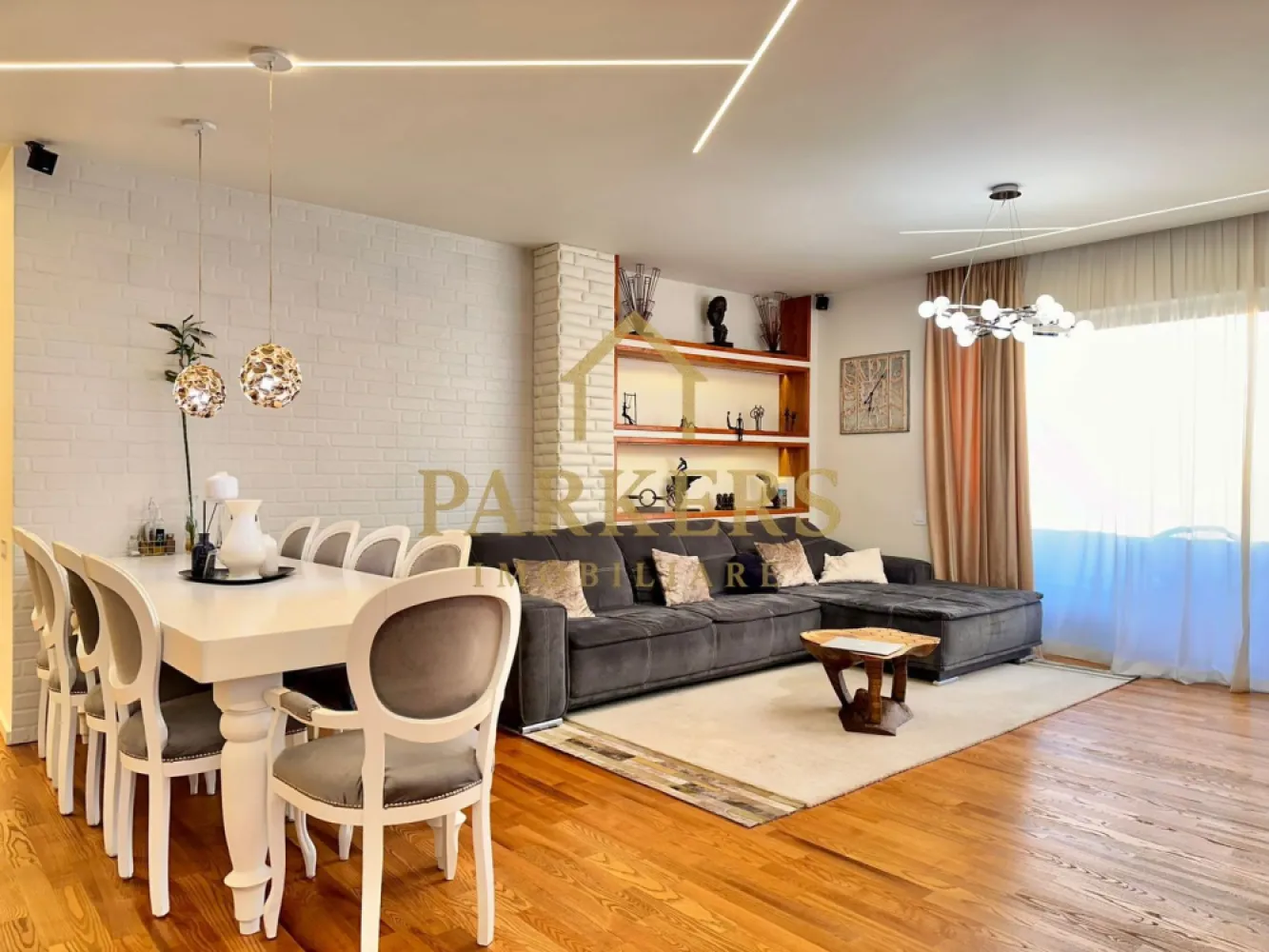 Penthouse exclusivist 180mp, terase 250mp, zona Buna Ziua - Parkers Imobiliare vă propune spre vânzare un penthouse impresionant, dispus pe două niveluri, cu o suprafață utilă de 180 mp și terase spectaculoase de 250 mp, conceput pentru un stil de viață rafinat, cu accent pe spațiu, intimitate și confort.

Caracteristici principale:
- Suprafață utilă: 180 mp
- Dispunere pe două niveluri
- Terase panoramice în suprafață totală de 250 mp
- Acces privat direct din lift în apartament
- Două locuri de parcare subterane

Compartimentare:
- Nivel principal:
- Living generos, cu zonă de dining
- Bucătărie open-space, complet utilată, cu electrocasnice de ultimă generație
- 4 camere spațioase
- 3 băi complet echipate
- Cameră tehnică
- Cameră de relaxare / hobby

Finisaje și dotări:
- Mobilier premium
- Finisaje de înaltă calitate
- Suprafețe vitrate ample, lumină naturală abundentă
- Design interior elegant, atent detaliat

Terase:
- Spațiu generos pentru zonă lounge și dining exterior
- Posibilitate amenajare zonă grătar sau jacuzzi
- Vedere panoramică asupra orașului
- Intimitate și deschidere amplă

Această proprietate reprezintă o combinație rară între eleganță, funcționalitate și exclusivitate, fiind ideală pentru cei care își doresc o locuință reprezentativă, într-un cadru urban premium.