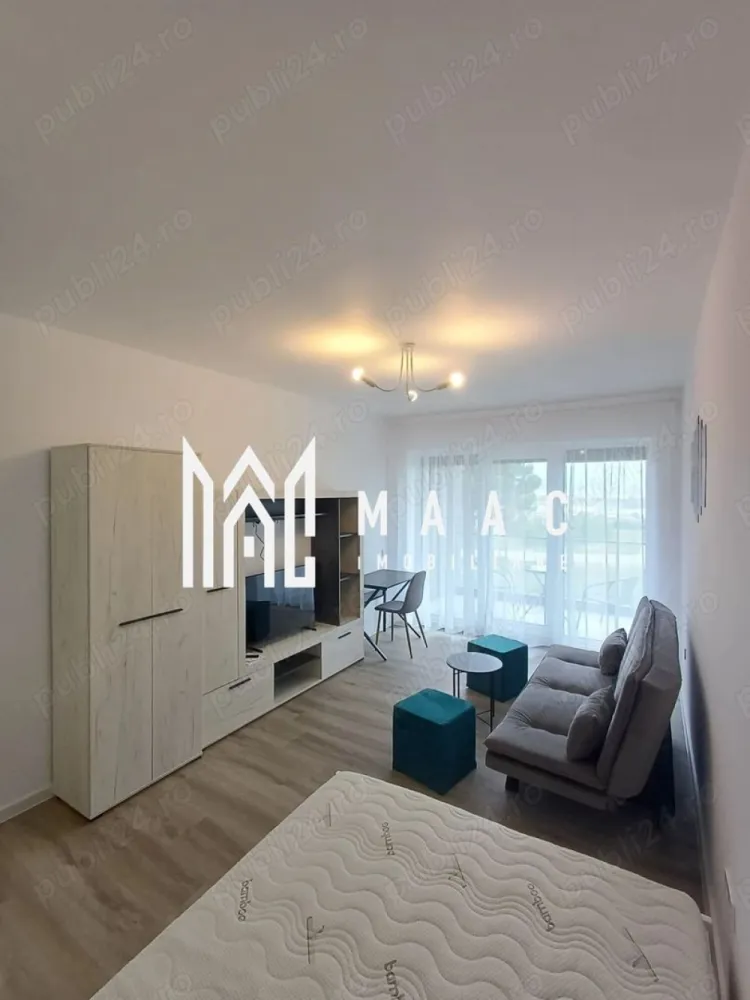 Garsioneră | Parter | 37MPU | Parcare I Da Vinci Homes - MAAC Imobiliare vă propune spre închiriere o garsonieră nouă, situată la parterul unei vile cu 3 niveluri, construcție 2025, în cartierul Da Vinci Homes – Cristian, în proximitatea zonei industriale vest a Sibiului, o locație potrivită pentru cei care își doresc acces rapid către oraș și un cadru rezidențial modern.

Locuința este compartimentată eficient și beneficiază de bucătărie separată, balcon orientat spre sud cu vedere spre munți și loc de parcare inclus. Garsoniera este complet nouă și dotată cu încălzire în pardoseală și jaluzele electrice, oferind un nivel ridicat de confort.

Compusă din: cameră de zi- dormitor cu acces către balcon, bucătărie separată, baie, hol de acces

Condiții de închiriere:
-Perioadă minimă de 1 an
-Fumatul este interzis în apartament
-Se percepe garanție în cuantumul unei chirii lunare
-Acceptăm animale de companie în anumite condiții

Pentru mai multe detalii și programarea unei vizionări, vă rugăm să menționați ID CP2951553.