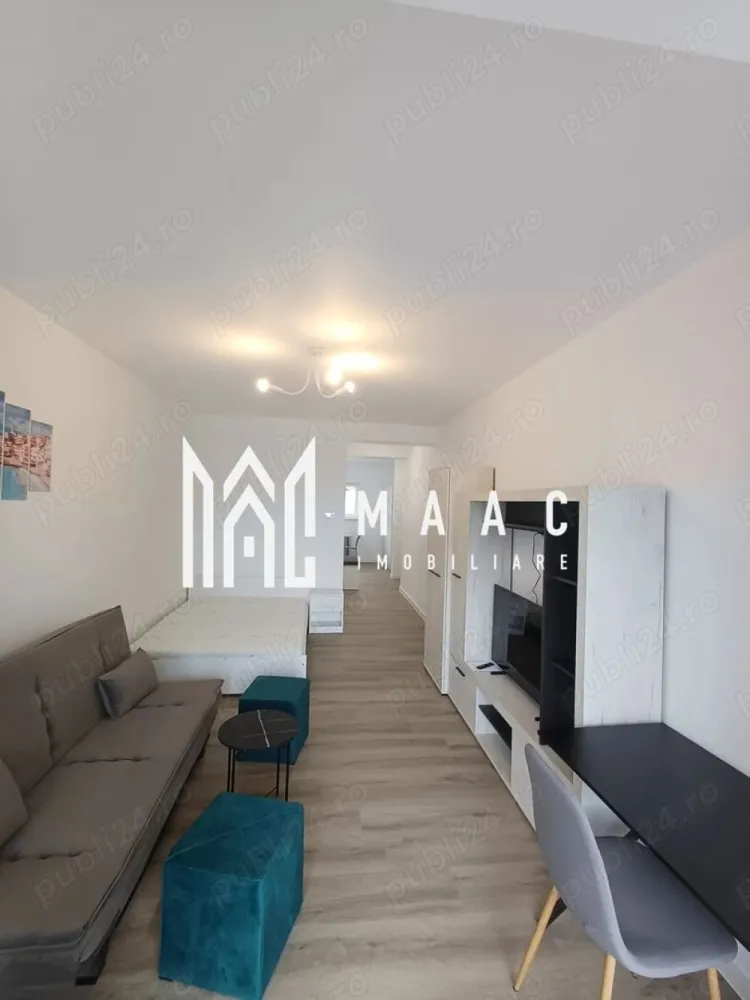 Garsioneră | Parter | 37MPU | Parcare I Da Vinci Homes - MAAC Imobiliare vă propune spre închiriere o garsonieră nouă, situată la parterul unei vile cu 3 niveluri, construcție 2025, în cartierul Da Vinci Homes – Cristian, în proximitatea zonei industriale vest a Sibiului, o locație potrivită pentru cei care își doresc acces rapid către oraș și un cadru rezidențial modern.

Locuința este compartimentată eficient și beneficiază de bucătărie separată, balcon orientat spre sud cu vedere spre munți și loc de parcare inclus. Garsoniera este complet nouă și dotată cu încălzire în pardoseală și jaluzele electrice, oferind un nivel ridicat de confort.

Compusă din: cameră de zi- dormitor cu acces către balcon, bucătărie separată, baie, hol de acces

Condiții de închiriere:
-Perioadă minimă de 1 an
-Fumatul este interzis în apartament
-Se percepe garanție în cuantumul unei chirii lunare
-Acceptăm animale de companie în anumite condiții

Pentru mai multe detalii și programarea unei vizionări, vă rugăm să menționați ID CP2951553.