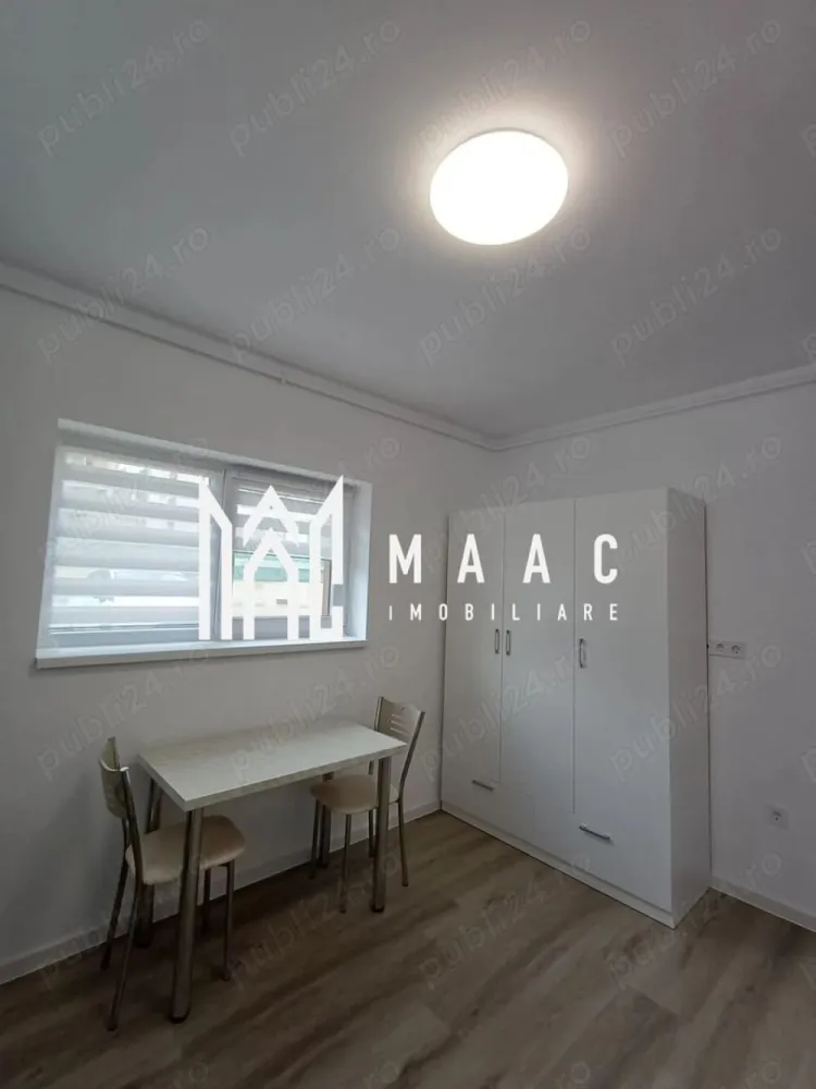 Garsioneră | Parter | 37MPU | Parcare I Da Vinci Homes - MAAC Imobiliare vă propune spre închiriere o garsonieră nouă, situată la parterul unei vile cu 3 niveluri, construcție 2025, în cartierul Da Vinci Homes – Cristian, în proximitatea zonei industriale vest a Sibiului, o locație potrivită pentru cei care își doresc acces rapid către oraș și un cadru rezidențial modern.

Locuința este compartimentată eficient și beneficiază de bucătărie separată, balcon orientat spre sud cu vedere spre munți și loc de parcare inclus. Garsoniera este complet nouă și dotată cu încălzire în pardoseală și jaluzele electrice, oferind un nivel ridicat de confort.

Compusă din: cameră de zi- dormitor cu acces către balcon, bucătărie separată, baie, hol de acces

Condiții de închiriere:
-Perioadă minimă de 1 an
-Fumatul este interzis în apartament
-Se percepe garanție în cuantumul unei chirii lunare
-Acceptăm animale de companie în anumite condiții

Pentru mai multe detalii și programarea unei vizionări, vă rugăm să menționați ID CP2951553.