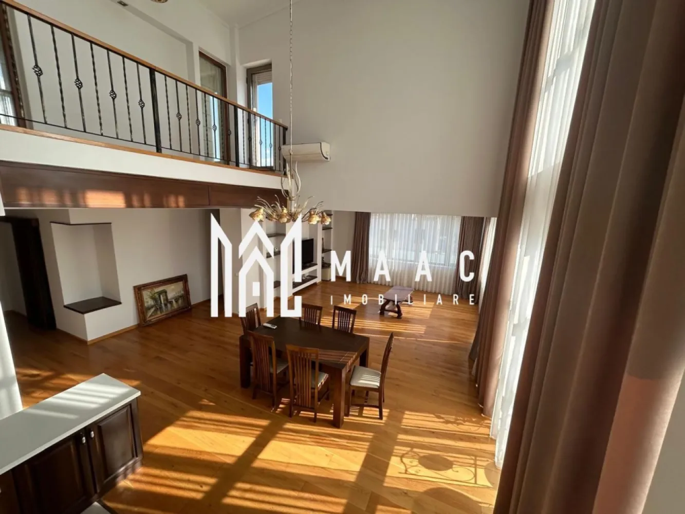 Penthouse exclusivist de închiriat – Strada Hipodromului, Sibiu - MAAC Imobiliare va propune spre închiriere un penthouse spectaculos, situat pe Strada Hipodromului din Sibiu, cu o suprafață utilă generoasă de 170 mp, completată de o terasă impresionantă de 50 mp și un balcon de 30 mp. Proprietatea se remarcă prin spațiile ample, luminozitatea naturală abundentă și finisajele premium.

Compartimentare inteligentă – confort pe două niveluri

Nivel inferior:
2 dormitoare luminoase
Living spațios cu zonă de dining și tavan înalt
Bucătărie complet utilată
Cămară
Dressing
Spații multiple de depozitare
Balcon de 30 mp

Nivel superior:
Dormitor matrimonial generos
Baie
Terasă panoramică de 50 mp – ideală pentru relaxare sau zonă de socializare

Dotări și finisaje premium

Încălzire prin centrală termică proprie, cu posibilitate de utilizare a pompei de căldură
Panouri fotovoltaice – eficiență energetică ridicată
5 aparate de aer condiționat
Uși interioare din lemn masiv de stejar
Ferestre mari, cu suprafețe vitrate ample ce oferă lumină naturală pe tot parcursul zilei
Finisaje elegante și materiale de calitate superioară

Un spațiu cu adevărat special
Tavanul înalt și zona de tip duplex creează o atmosferă aerisită și sofisticată, iar terasa generoasă oferă un cadru perfect pentru seri relaxante, cu priveliște deschisă asupra orașului.
Locația este excelentă, într-o zonă apreciată din Sibiu, cu acces facil către punctele de interes, magazine, școli și mijloace de transport.

Penthouse-ul este ideal pentru cei care își doresc spațiu, confort, eficiență energetică și un stil de viață premium.
Pentru mai multe detalii si programarea unei vizionari va rugam sa specificati ID: CP2954323.
