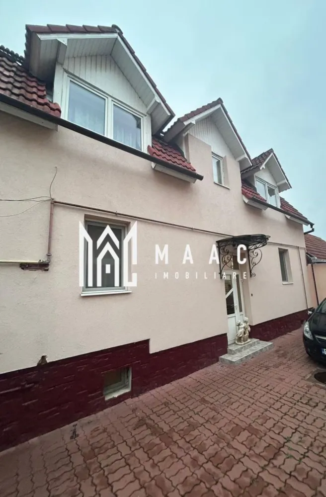 Casa Individuală | 260 MPU | Piscină Interioară | Curte Libera 100 MP - MAAC Imobiliare vă propune spre vânzare o proprietate rară și deosebit de versatilă, situată în Turnișor, într-un cartier liniștit și bine conectat cu orașul.

Descrierea proprietății
Casa este individuală și este formată din două corpuri distincte, oferind multiple posibilități de locuire, relaxare și divertisment.

Corpul 1 – Locuința principală
Suprafață utilă: aprox. 140 mp
Compartimentare: 5 camere, bucătărie, 2 băi, pivniță, pod, cameră tehnică. 
Acest corp oferă spații generoase, luminoase și bine distribuite, potrivite pentru o familie numeroasă sau pentru cei care își doresc confort și intimitate.

Corpul 2 – Relaxare & Entertainment
Piscină interioară – suprafață: aprox. 60 mp
Sală de oaspeți cu bar și biliard – suprafață: aprox. 60 mp
Un spațiu ideal pentru petrecerea timpului liber, organizarea evenimentelor private sau pentru transformarea într-o zonă de wellness completă.

Curtea
Suprafață: aprox. 100 mp
Complet pavată cu pișcoturi de beton
Ușor de întreținut și perfectă pentru parcări sau zonă de recreere exterioară

Alte beneficii
Încălzire centrală proprie
Proprietatea se vinde complet mobilată și utilată
Posibilitate excelentă pentru locuință + zonă de agrement, spațiu de business, casă multifamilială sau investiție 

Pentru mai multe detalii sau pentru a programa o vizionare, vă rugăm să ne contactați, specificând ID: CP2835317