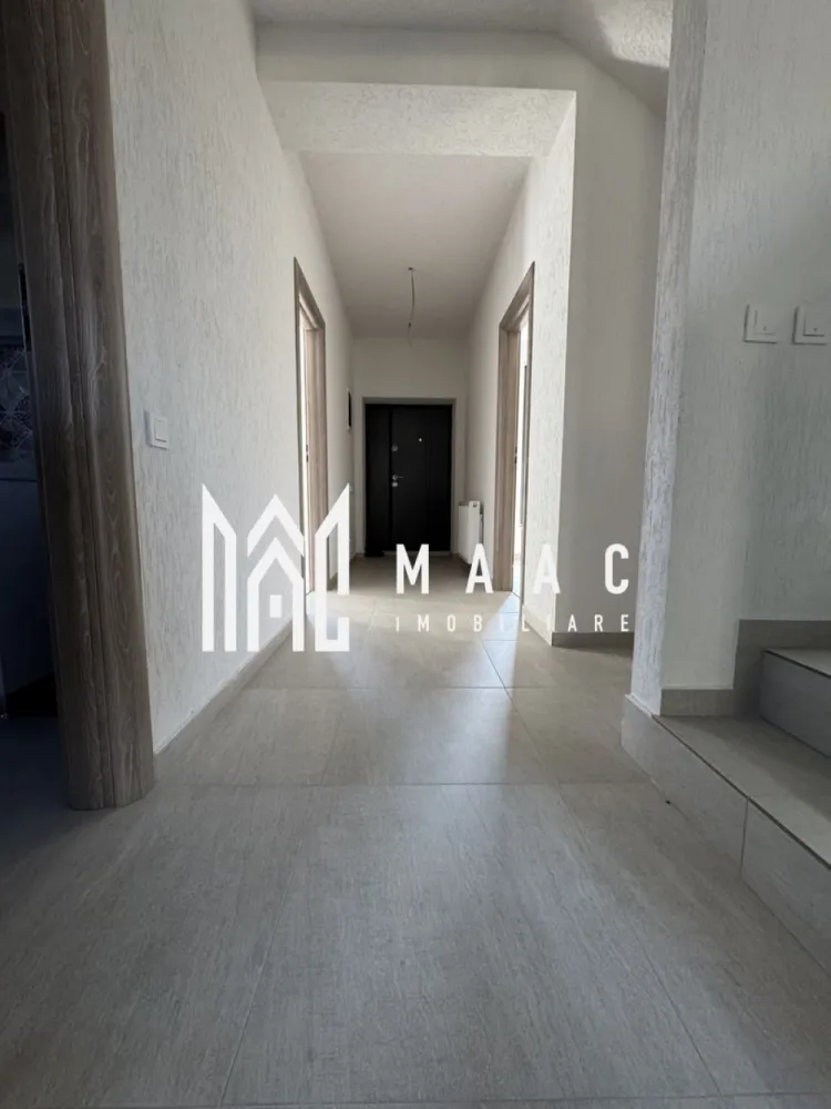 Casa 4 Camere | Teren 300MP | Zona - Vladesti Priporu - MAAC Imobilaire va propune spre vanzare o casa P+M in Vladesti - Priporu

An finalizare 2025,stare noua nelocuita,finisata si functionala 100%

suprafata teren 300mp

supr.construita -165mp

terasa acoperita -20mp

1.Compartimentare interioara: 

-parter: camera zi+bucatarie deschisa , birou, dormitor baie cu wc lavoar cada camera tehnica debara spatiu depozitare

-etaj - suita matrimoniala cu dressing room si baie(lavoar wc cada) 

2.Sistem constructiv:

-structura mixta Beton Armat si zidarie DUROTHERM 30S-parter,mansarda sarpanta din lemn+OSB3 tratate si ignifugate

-invelitoare tabla otel RODACH GERMAN SIMETRIC profilata vopsita negru mat
-termosistem cu polistiren 10cm EPS80 + tencuiala decorativa Webber si tamplarie PVC Salamander ROTO Click culoare gri cu geam termopan 4SEASONS

-instalatii sanitare termice teava PPR, elemente cupru, PHDE, toate zonele cu pardoseala incalzita iar in dormitoare radiatoare panouri otel

-instalatii electrice cupru si aparate montate(prize,intrerupatoare Panasonic + corpuri iluminat LED in bai si casa scarii)

-finiaje interioare tencuieli cu gled ipsos, compartimentari rigips cu zugraveli lavabile,
 placari faianta bai si bucatarie, scara interioara placata gresie, pardoseli parchet laminat 8mm in dormitoare,gresie bai si bucatarie living room,
 bai complet utilate(cada,vas WC,lavoar) 
usi de interior CLASSEN GERMAN OAK

-curtea exterioara- cu gradina amenajata(fara plante), 1loc parcare alei acces pavaj, trotuare perimetrale betonate, gard lateral beton sipca metal 
porti acces front stradal metal usi garaj automate cu 2telecomenzi
 
3.Utilitati:
-bransamente utilitati- curent electric 220VHidroelectrica
- apa si canalizare APAVIL, 
-gaz Engie (centrala IMMERGAS VICTRIX Terra 28kw montata inclusa cu ISCIR efectuat) -CP2815425