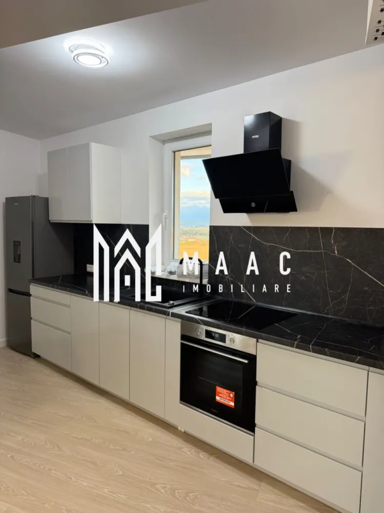 Apartament 3 camere nou | 2 balcoane | Parcare | Decomandat - MAAC IMOBILIARE aduce in atentia dumneavoastra, spre inchiriere, un apartament cu 3 camere, nou, la prima inchiriere, in zona Mihai Viteazu - Doamna Stanca (Evolution Residence). Detalii apartament: • Suprafață: 75 mp • Compartimentare: 3 camere (living+ 2 dormitoare) • Etaj 5 / cu 2 lifturi moderne • 2 balcoane spațioase cu access din living si ambele dormitoare, suprafața balcoane 23mp Dotări si beneficii: • Complet mobilat modern si utilat cu electrocasnice de calitate • Living luminos, open-space, cu bucatarie complet echipata • Dormitoare spațioase, fiecare cu ieșire pe balcon • Baie elegantă, finisaje premium • Bloc nou, dotat cu lifturi rapide si silențioase • Încălzire centrală (prin pardoseala), costuri reduse la întreținere • Loc de parcare disponibil Avantaj zona: • Cartier rezidențial modern si sigur • Acces rapid către centrul orașului • Aproape de supermarketuri, restaurante, Promenada mall, transport public Se percepe garantie in cuantumul unei chirii lunare. Se inchiriaza pe minim 12 luni. Pentru mai multe detalii precizati telefonic ca ati vazut anuntul cu ID: CP2793644