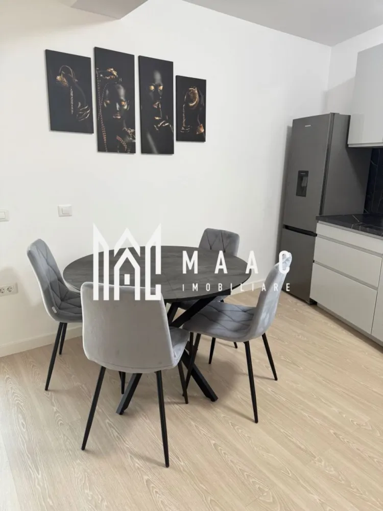 Apartament 3 camere nou | 2 balcoane | Parcare | Decomandat - MAAC IMOBILIARE aduce in atentia dumneavoastra, spre inchiriere, un apartament cu 3 camere, nou, la prima inchiriere, in zona Mihai Viteazu - Doamna Stanca (Evolution Residence). Detalii apartament: • Suprafață: 75 mp • Compartimentare: 3 camere (living+ 2 dormitoare) • Etaj 5 / cu 2 lifturi moderne • 2 balcoane spațioase cu access din living si ambele dormitoare, suprafața balcoane 23mp Dotări si beneficii: • Complet mobilat modern si utilat cu electrocasnice de calitate • Living luminos, open-space, cu bucatarie complet echipata • Dormitoare spațioase, fiecare cu ieșire pe balcon • Baie elegantă, finisaje premium • Bloc nou, dotat cu lifturi rapide si silențioase • Încălzire centrală (prin pardoseala), costuri reduse la întreținere • Loc de parcare disponibil Avantaj zona: • Cartier rezidențial modern si sigur • Acces rapid către centrul orașului • Aproape de supermarketuri, restaurante, Promenada mall, transport public Se percepe garantie in cuantumul unei chirii lunare. Se inchiriaza pe minim 12 luni. Pentru mai multe detalii precizati telefonic ca ati vazut anuntul cu ID: CP2793644